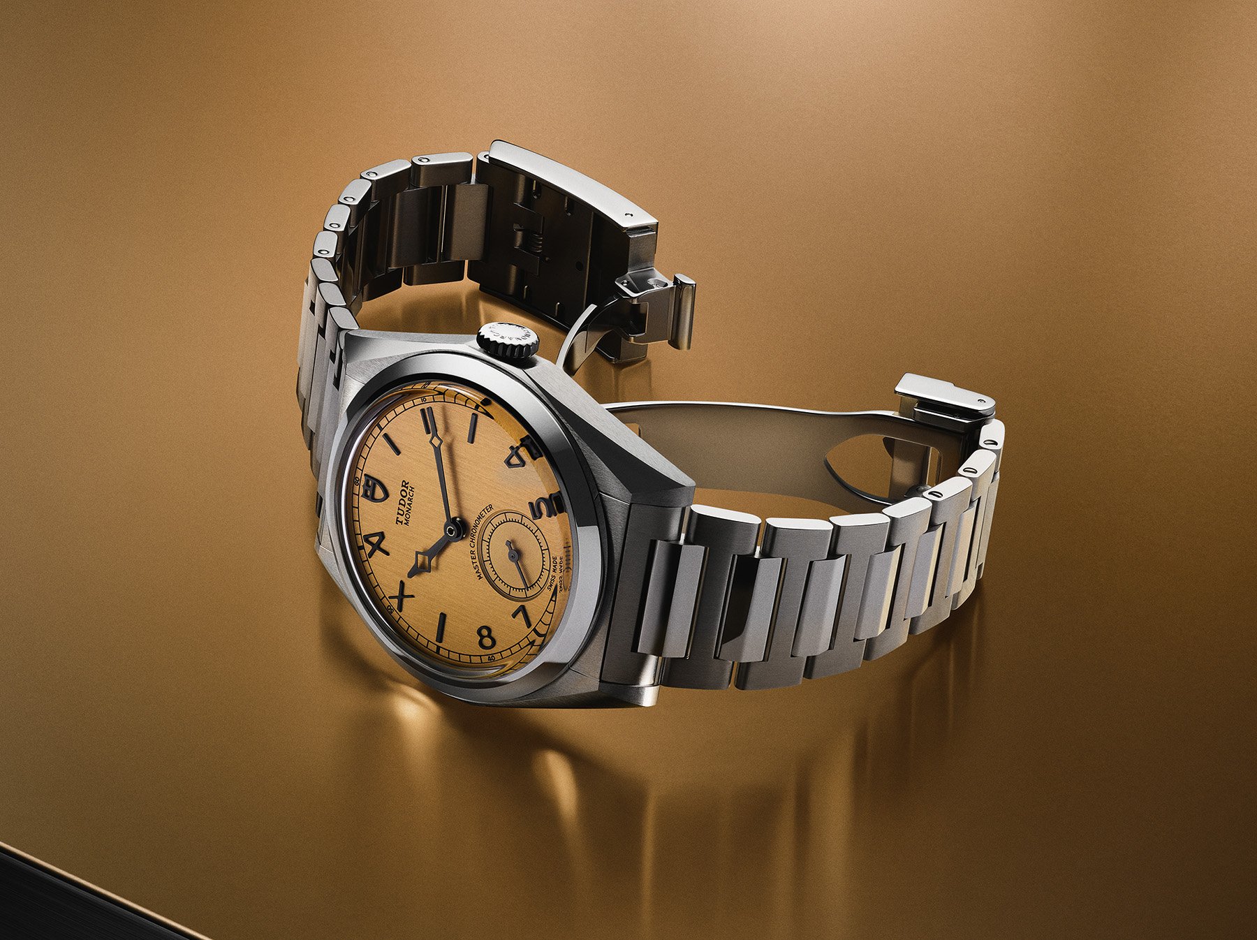 Tudor Monarch on its side, crown up, clasp open