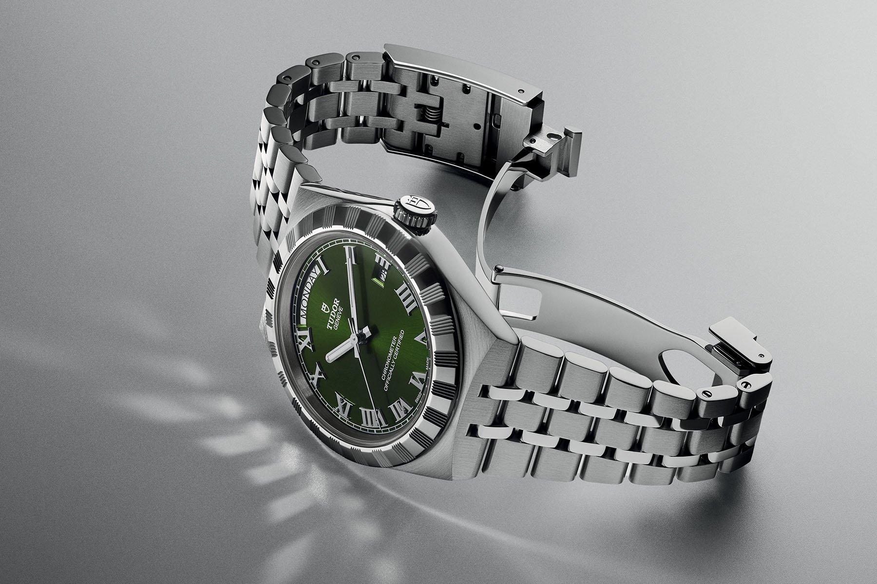 40mm green-dial Tudor Royal on its side, crown up, clasp open