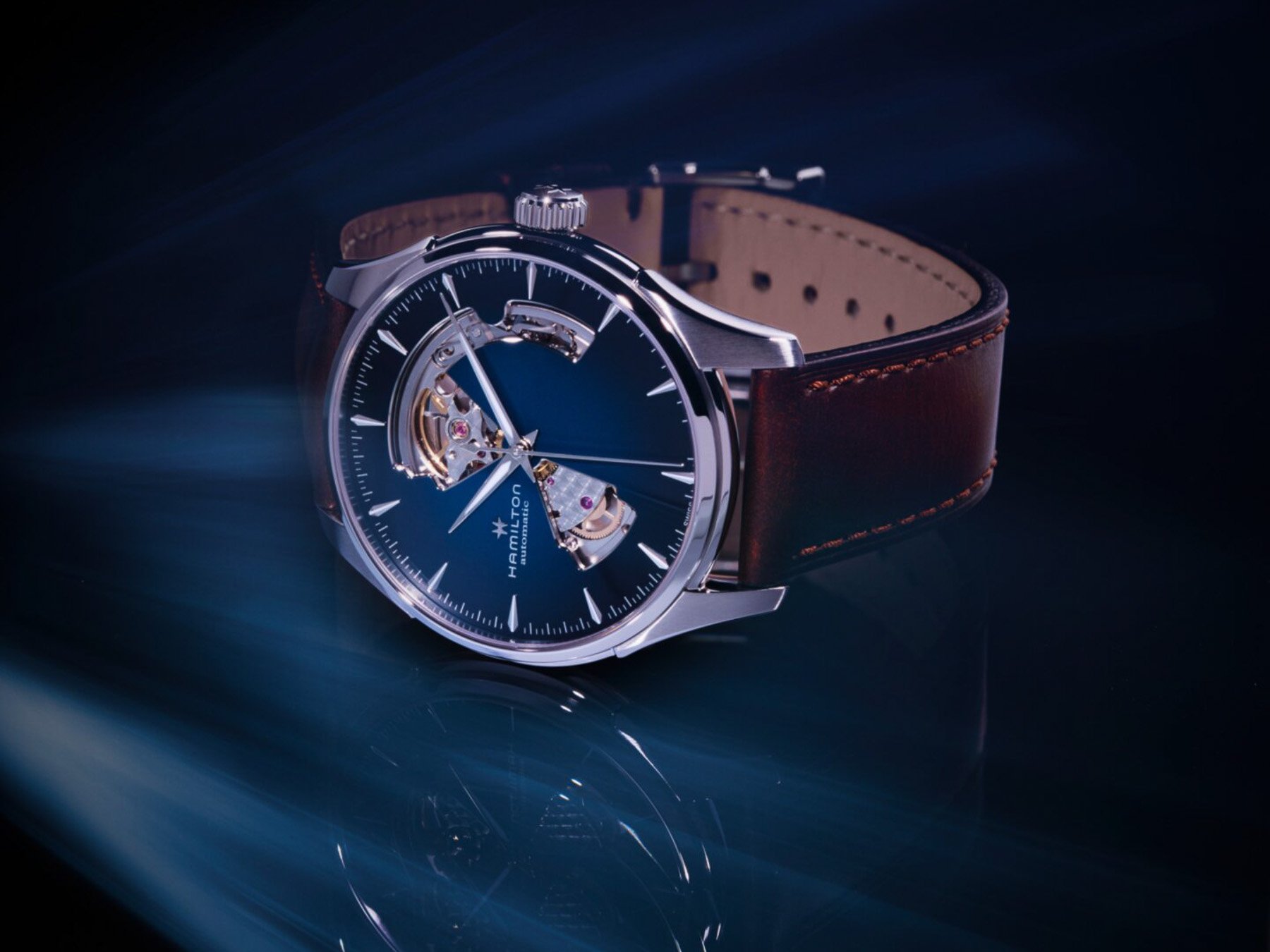 Disclosure Day watches — Hamilton Jazzmaster Open Heart 40mm ref. H32675540 on its side, crown up