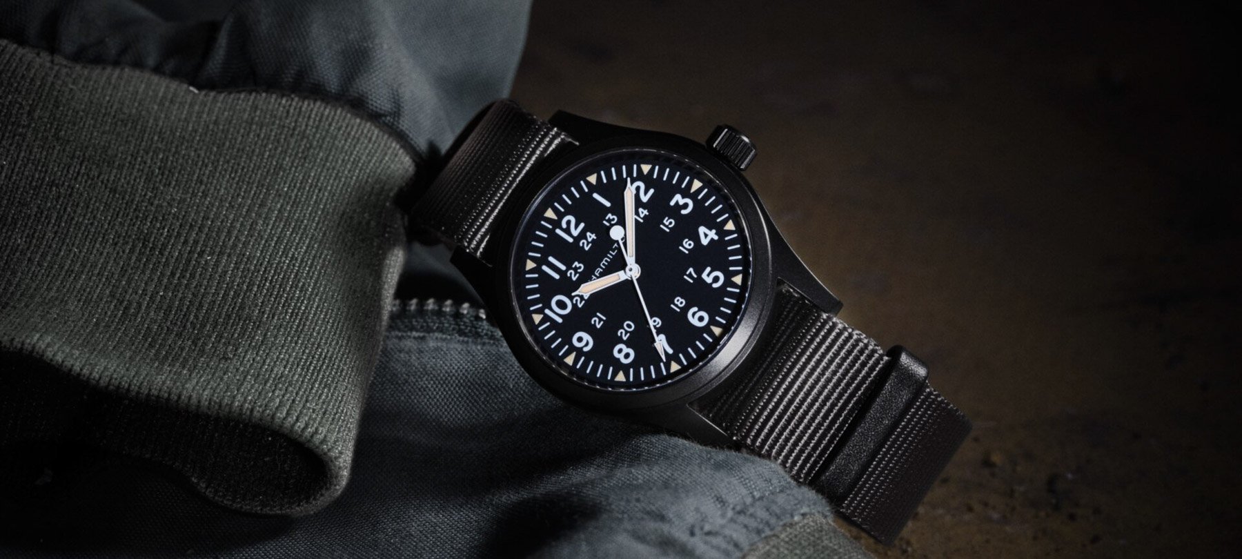 Disclosure Day watches — Hamilton Khaki Field Mechanical 38mm ref. H69409930 on its side, crown up
