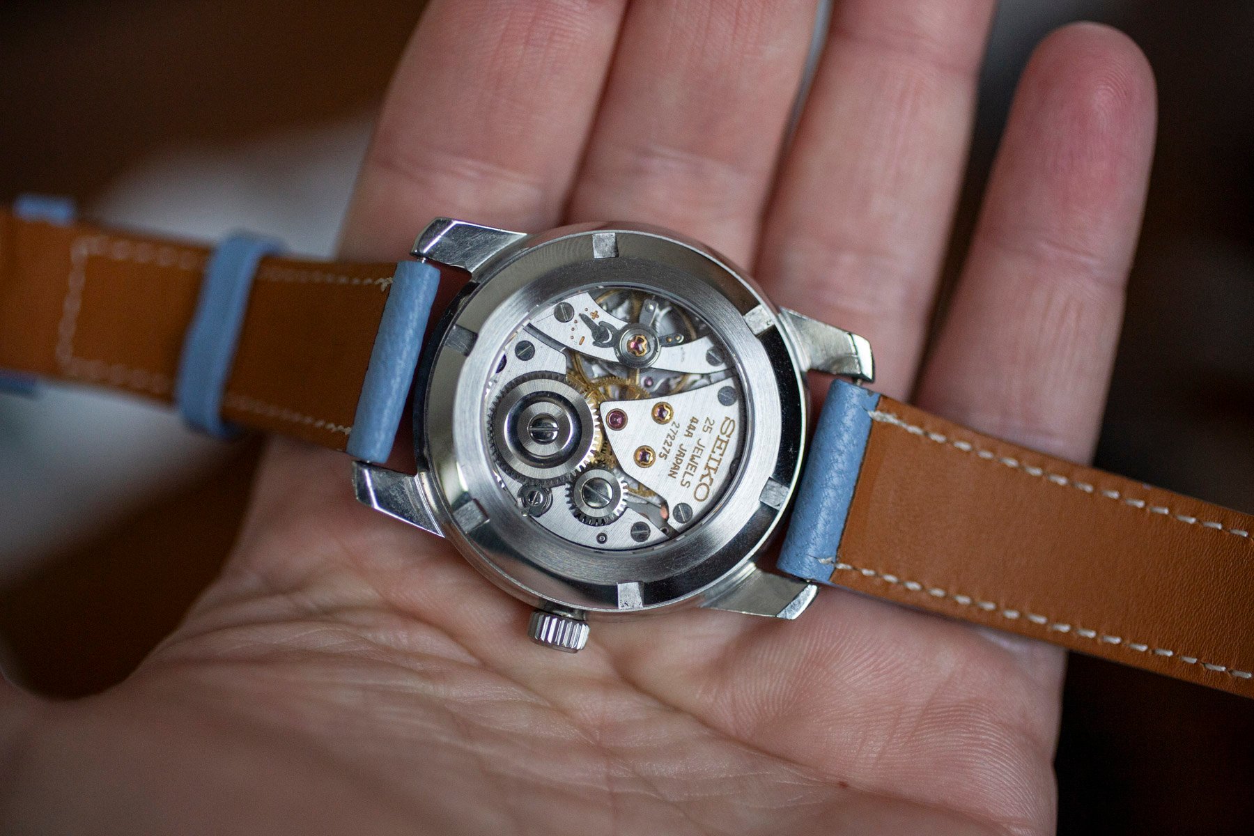 King Seiko 44-9990 in hand, face down, with display case back