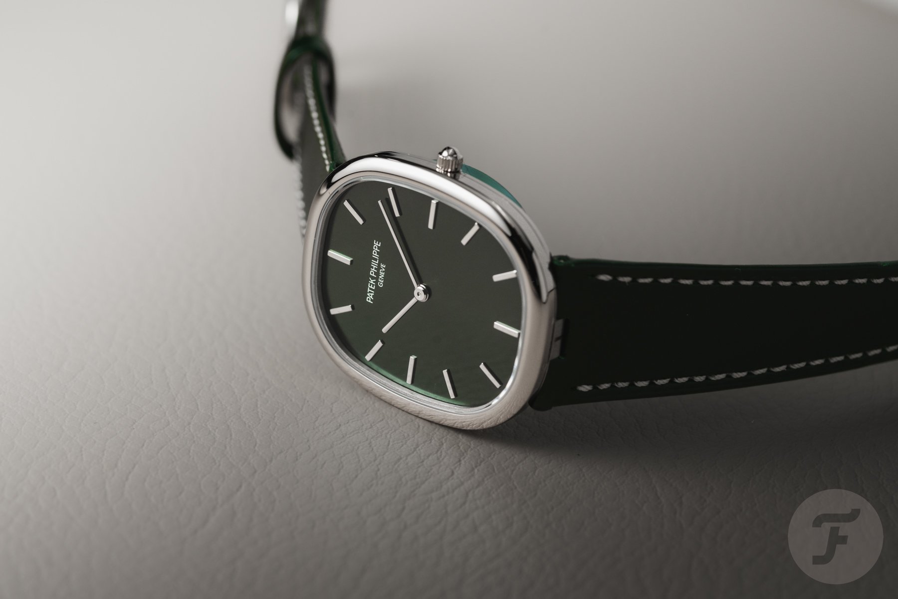 Patek Philippe Golden Ellipse ref. 5738G-001 on its side
