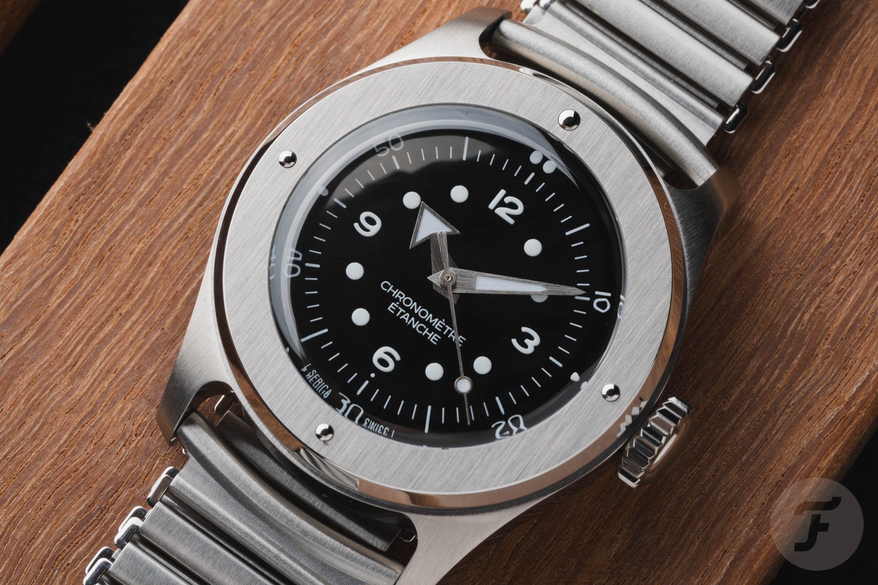 black-dial Serica 7505 flat-lay, up close