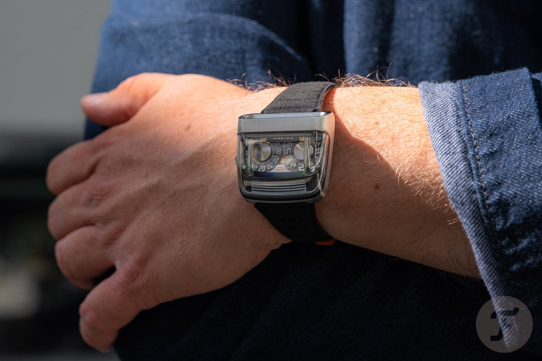 Amida Digitrend OSII Black on wrist, arms crossed