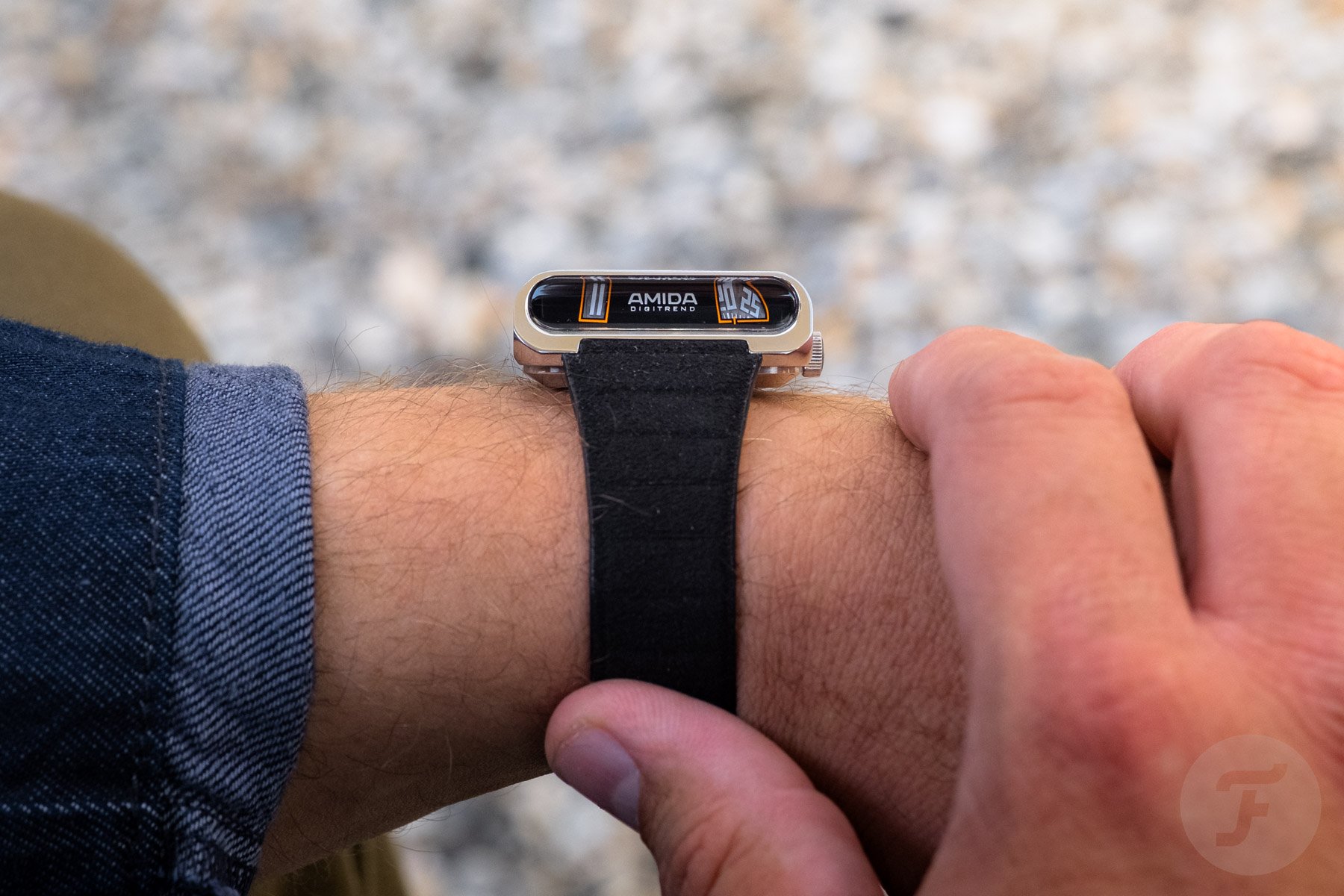 Amida Digitrend OSII Black on wrist, showing time display