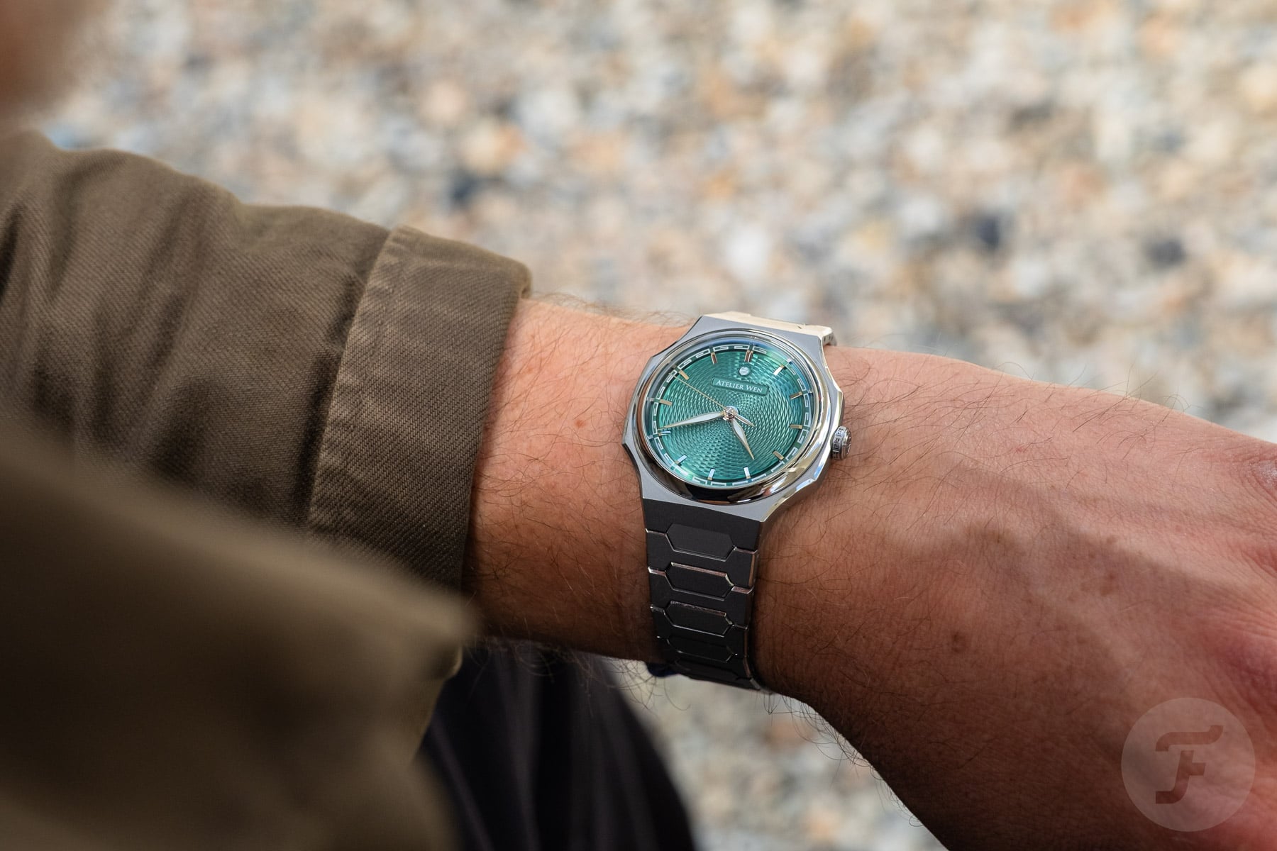 Atelier Wen Perception V3 Yún on wrist, over-shoulder shot