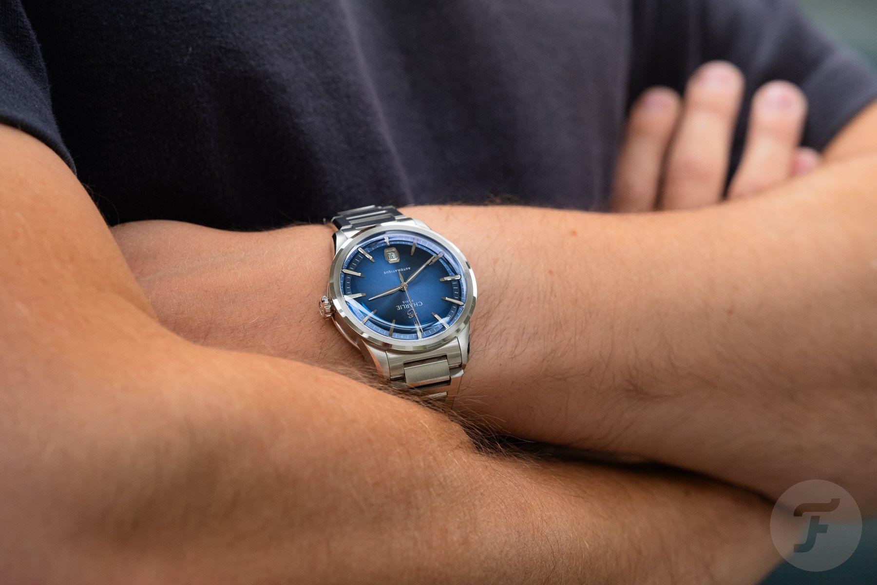 Charlie Paris Alliance arms crossed wristshot