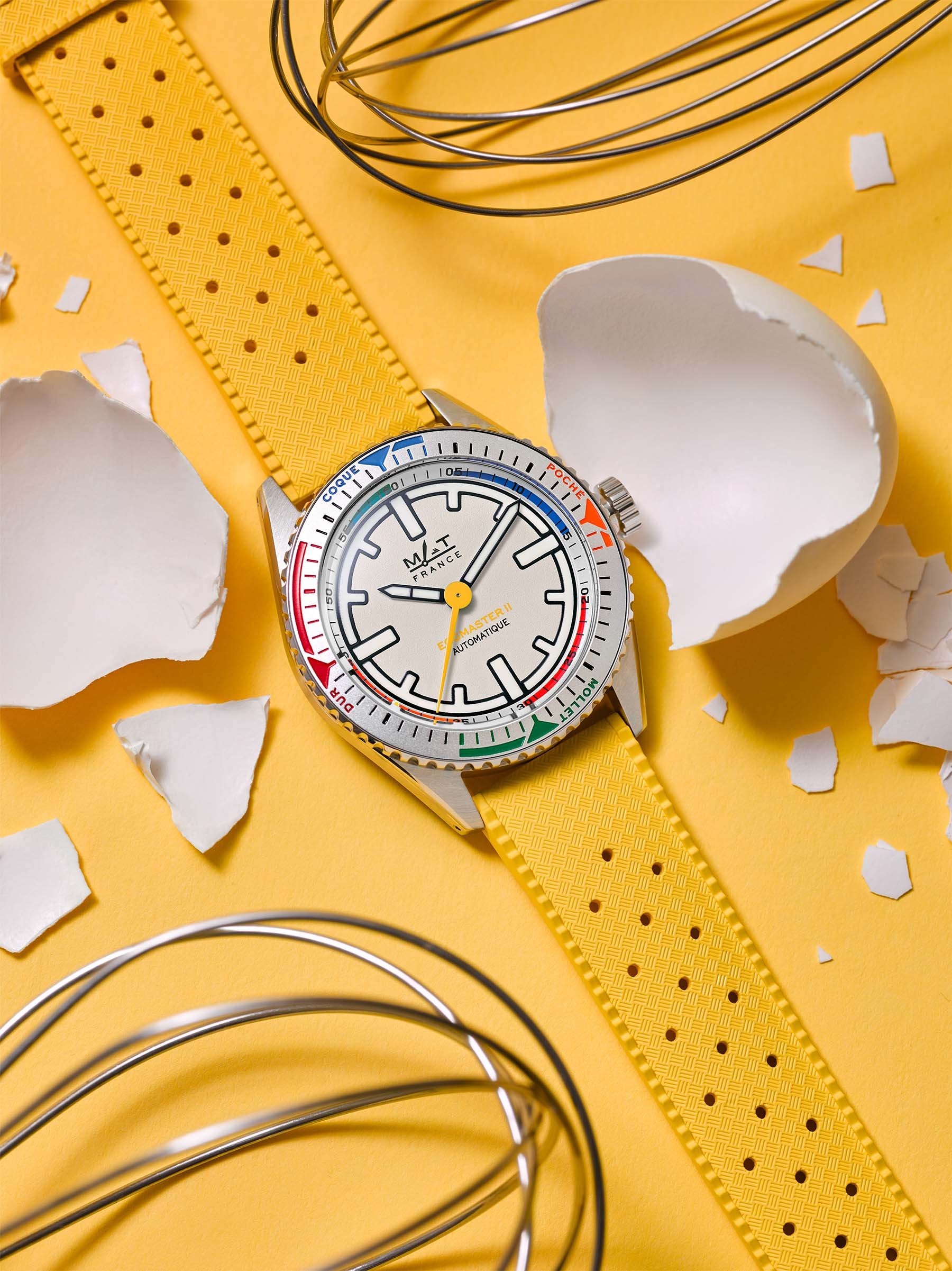 MAT Egg Master II flat-lay with whisks and cracked eggshells