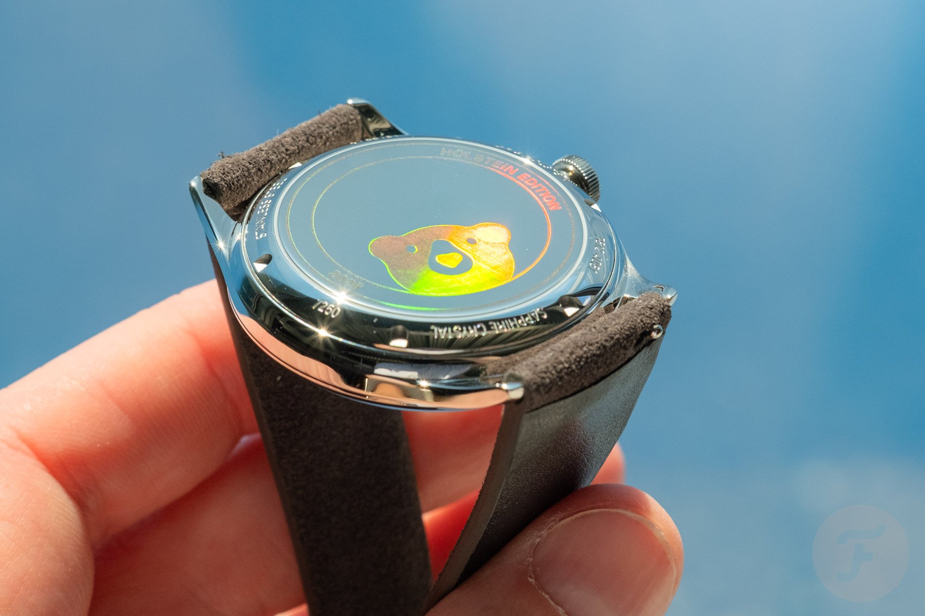 Oris Hölstein Edition 2026 case back with Oris Bear reflecting rainbow colors