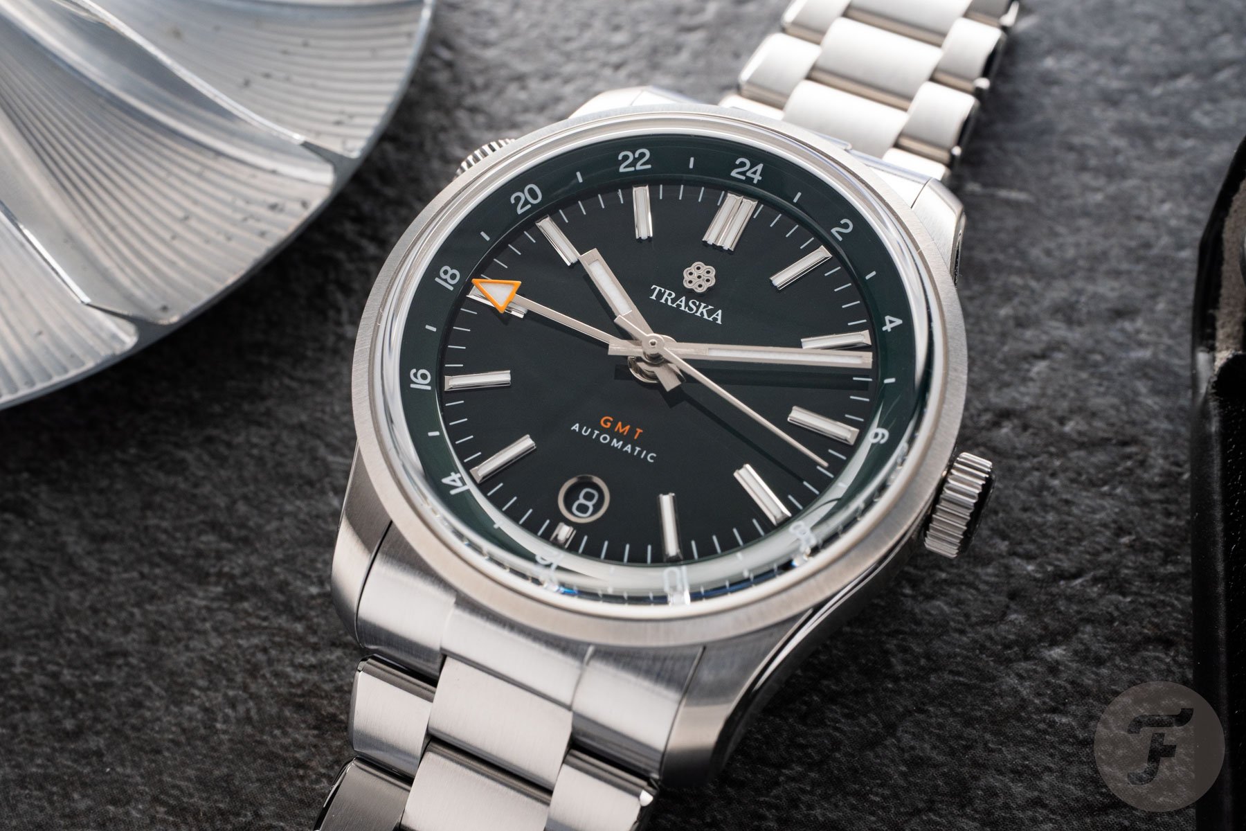 Traska Venturer GMT Carbon Black flat-lay, up close