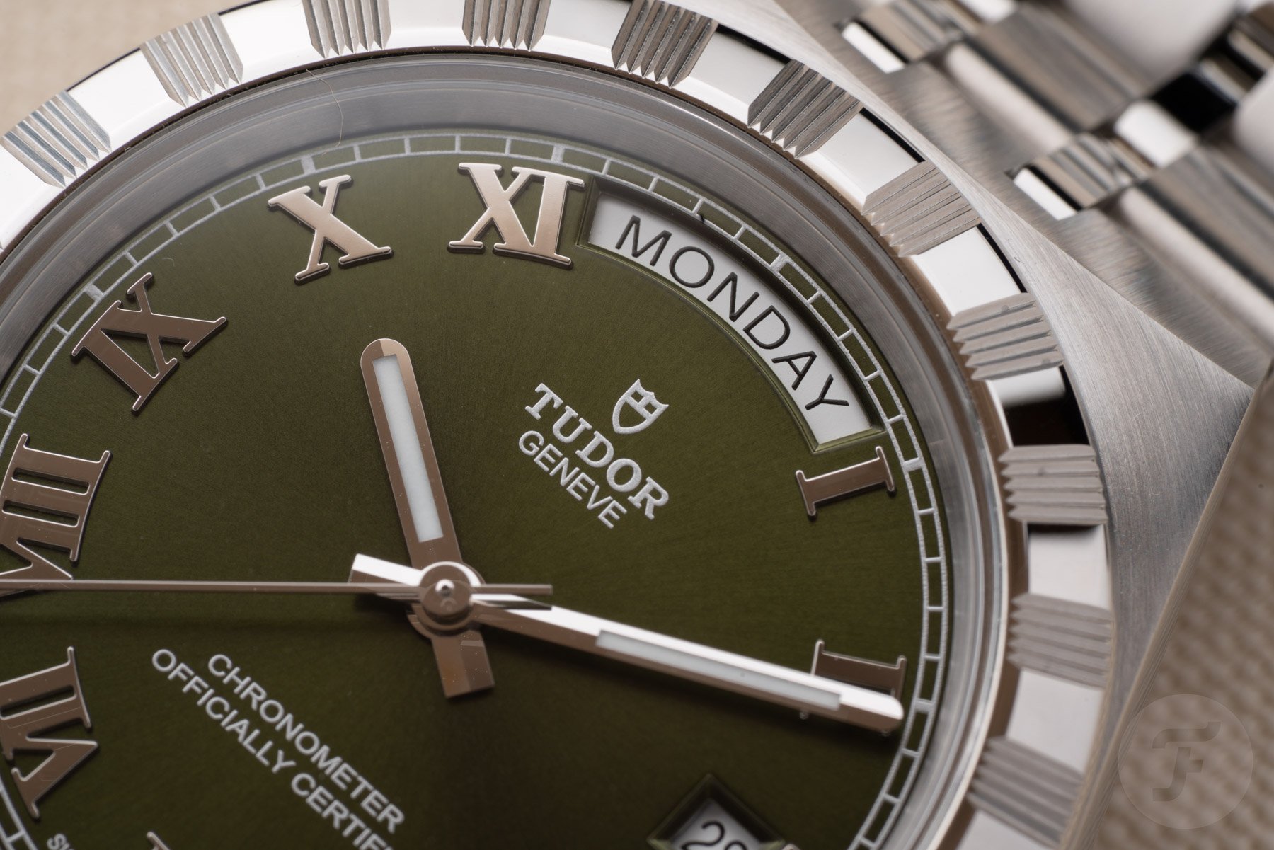 green-dial 40mm Tudor Royal handset and day display up close