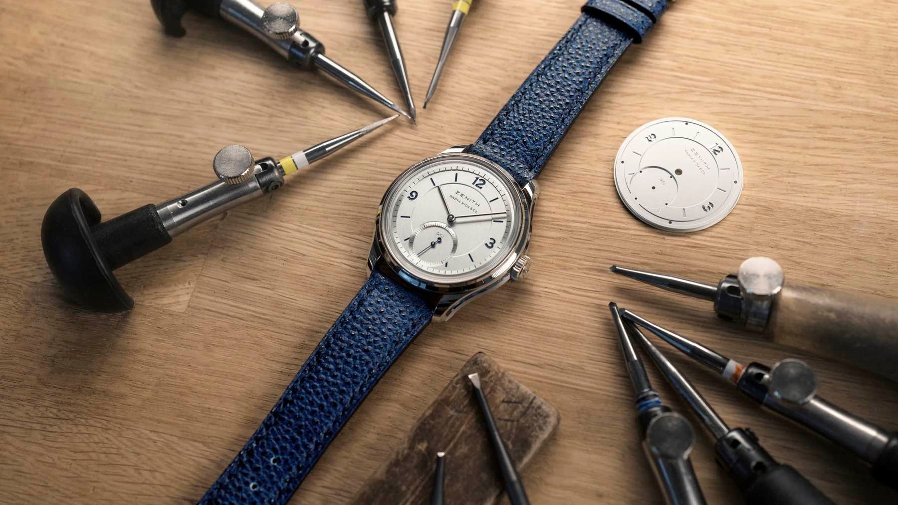 Zenith G.F.J. Calibre 135 Double Signed With Naoya Hida & Co. flat-lay on a work bench with tools