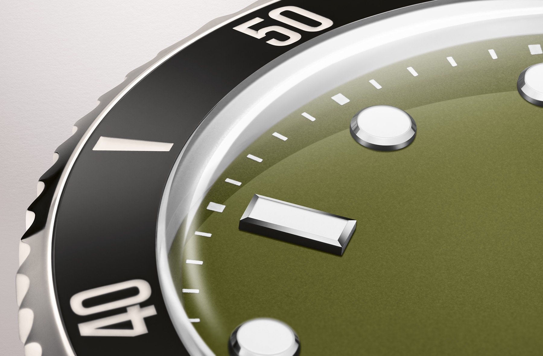green-dial Oris Divers Date indexes