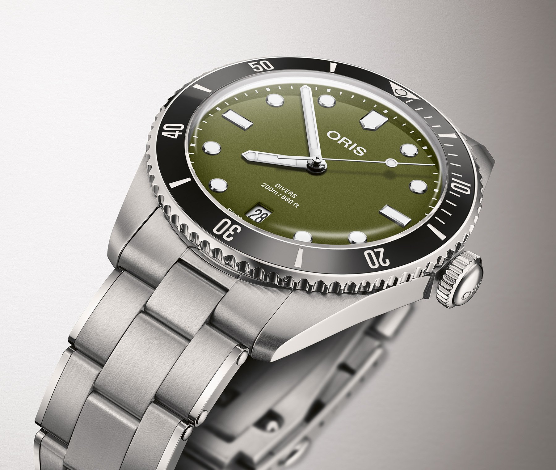 green-dial Oris Divers Date up close, angled