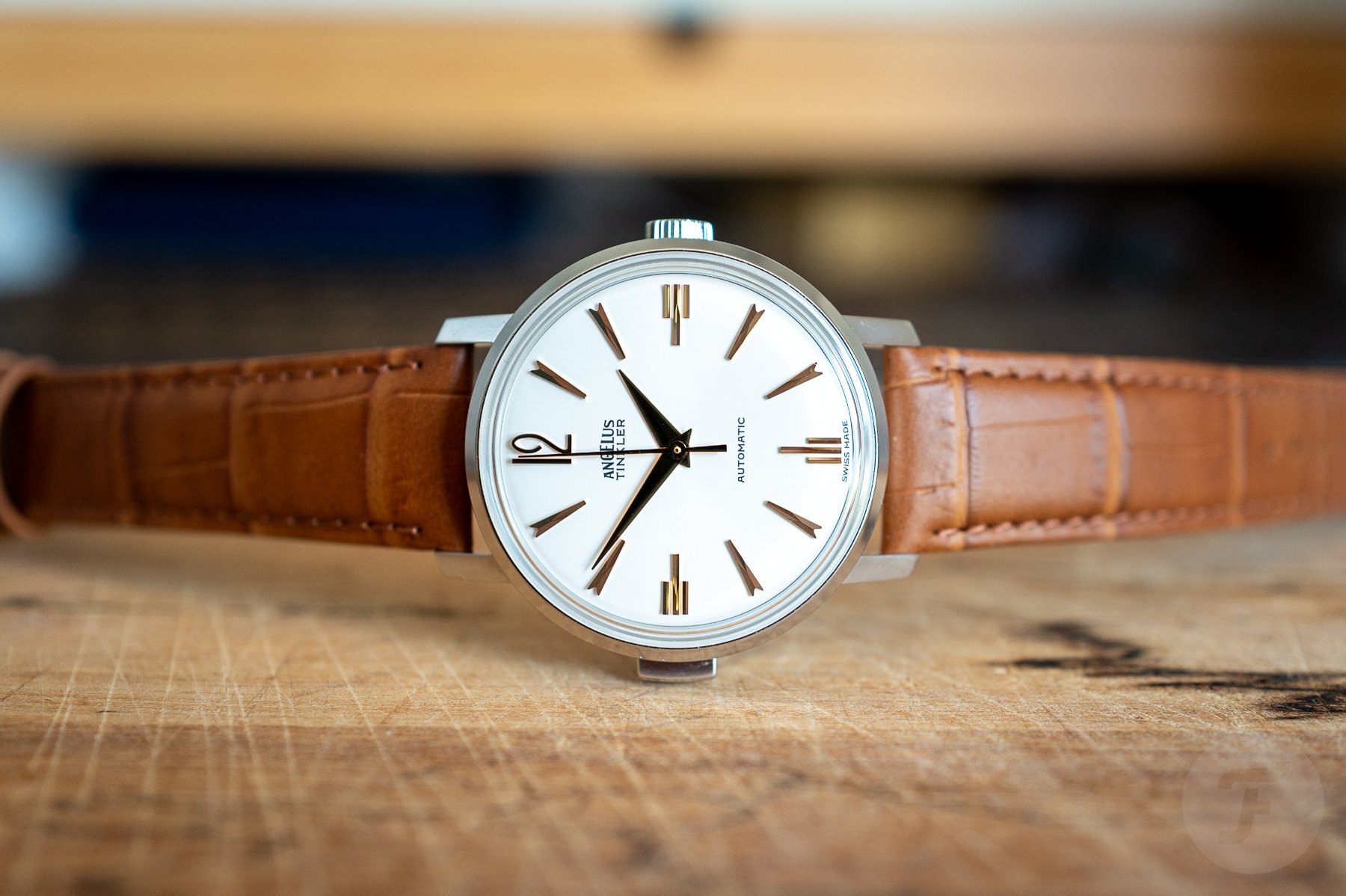 Angelus Tinkler 1958 Steel Quarter Repeater on its side, crown up