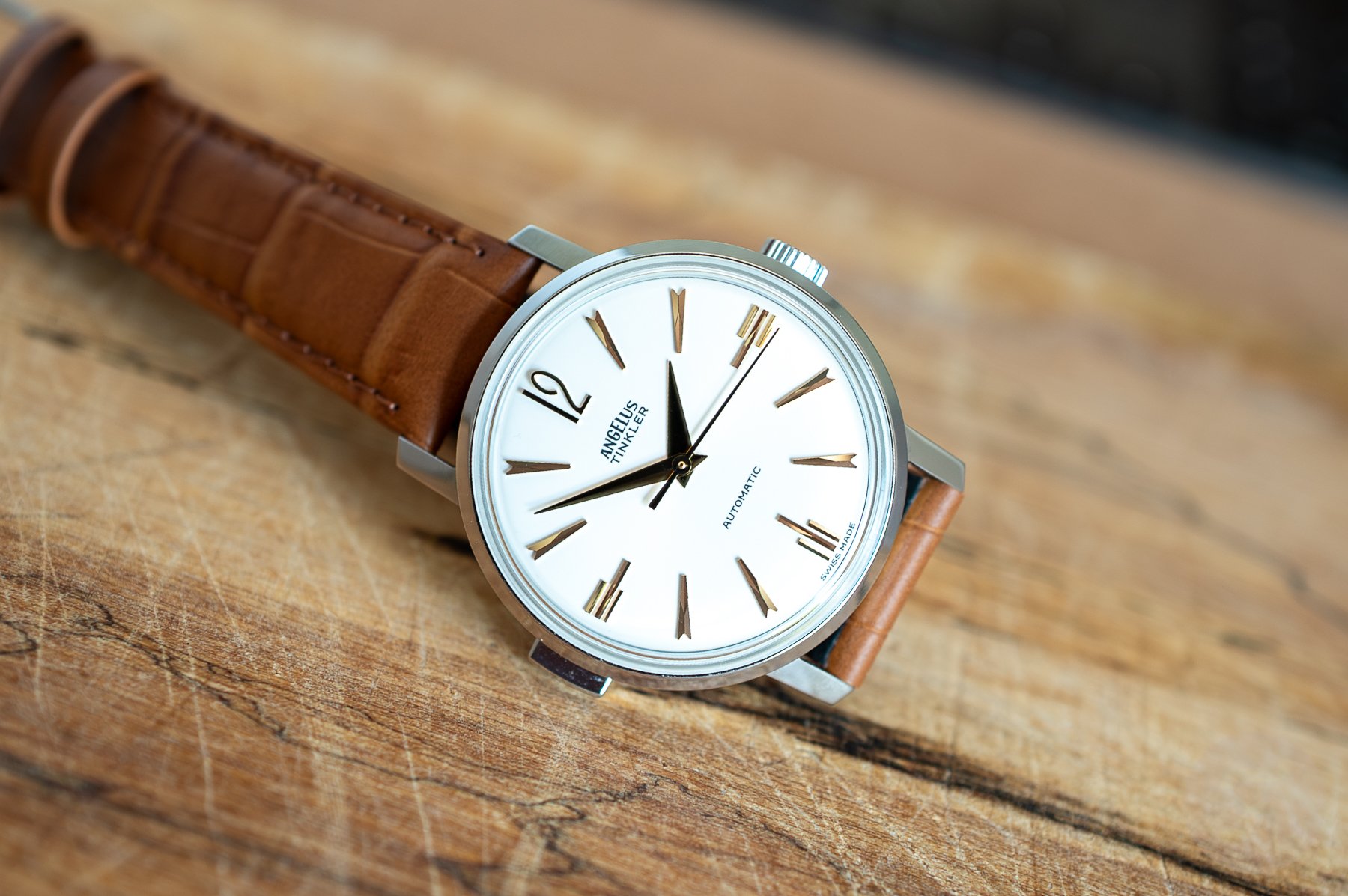 Angelus Tinkler 1958 Steel Quarter Repeater on its side, crown up