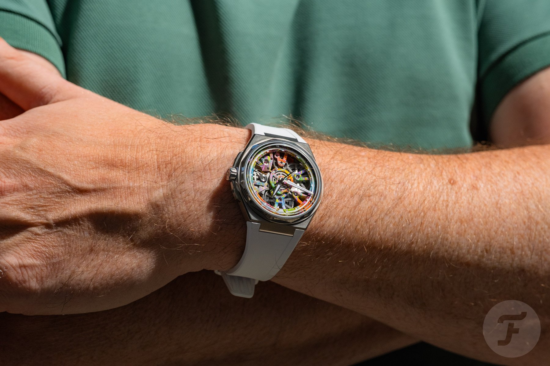 Christopher Ward Twelve Xander on wrist, arms crossed