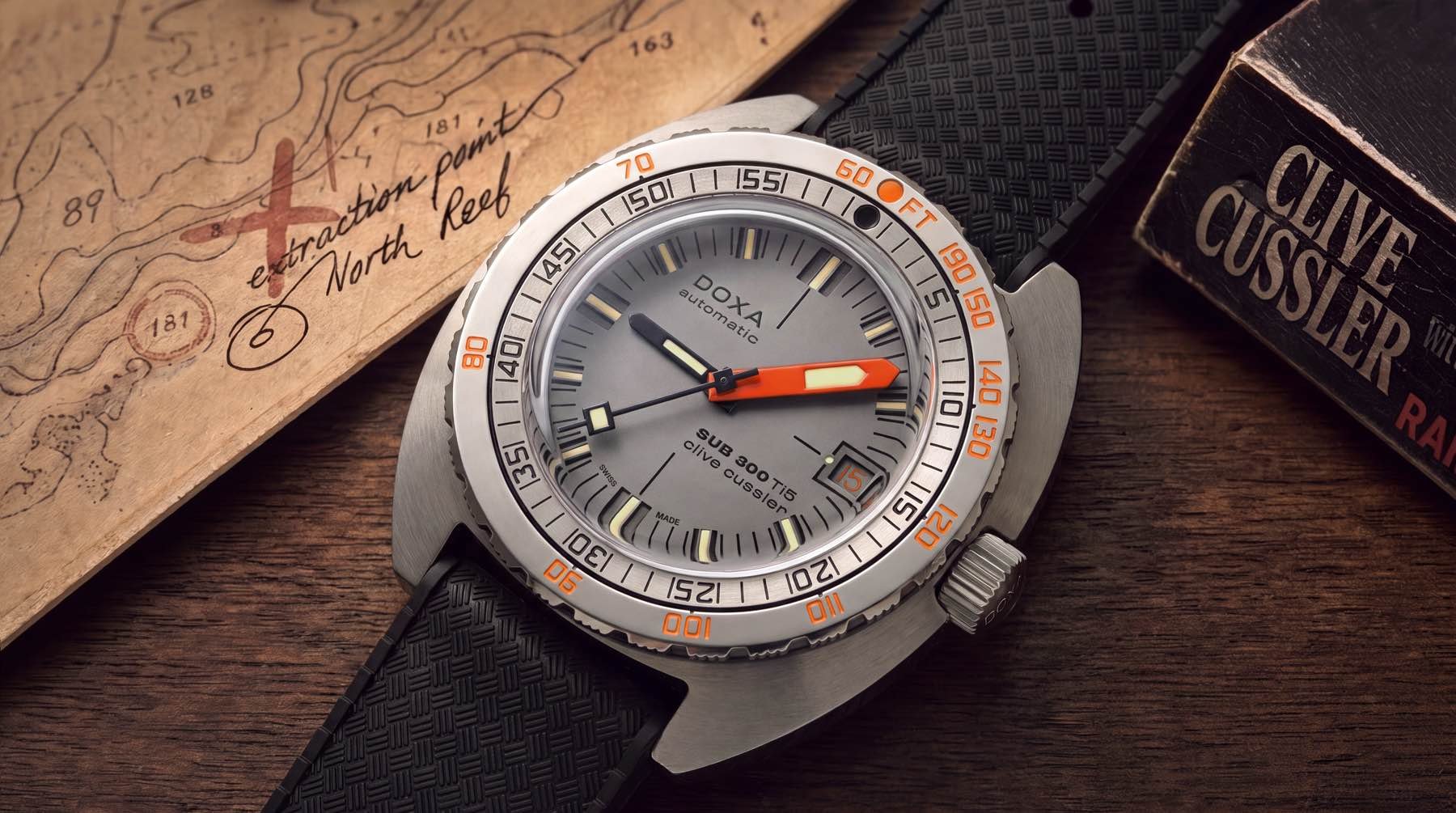 Doxa Sub 300 Ti5 Clive Cussler flat-lay