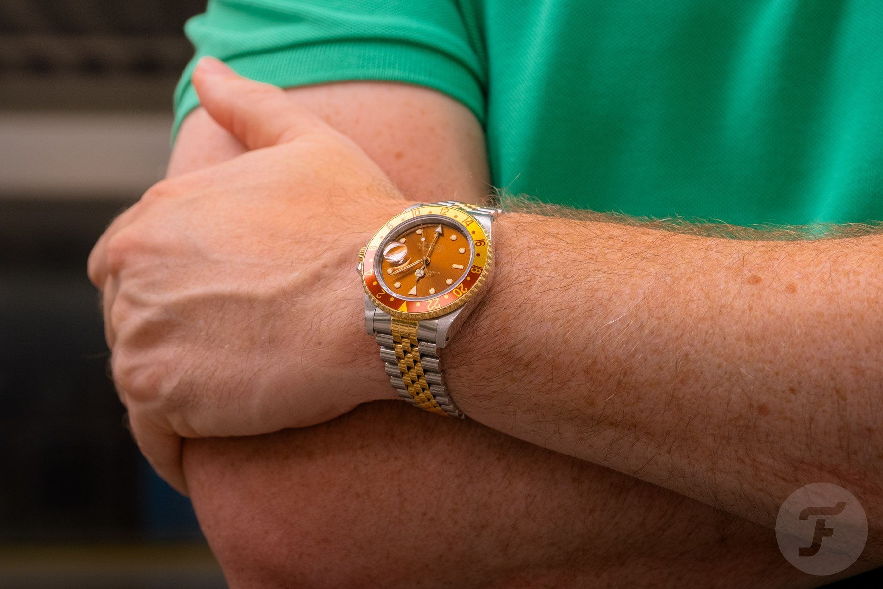 watches every collector should own at least once — Rolex GMT-Master II ref. 16713 on wrist, arms crossed