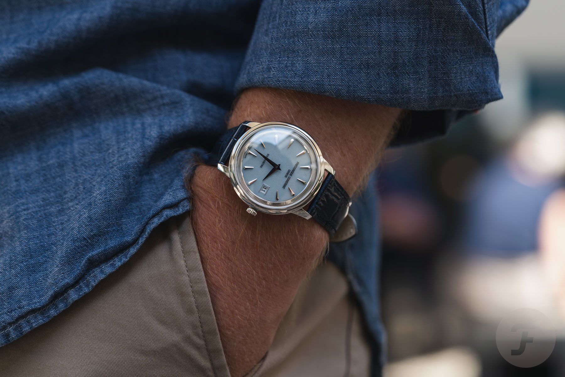 blue-dial Frederique Constant Moneta Solarmetre pocket shot
