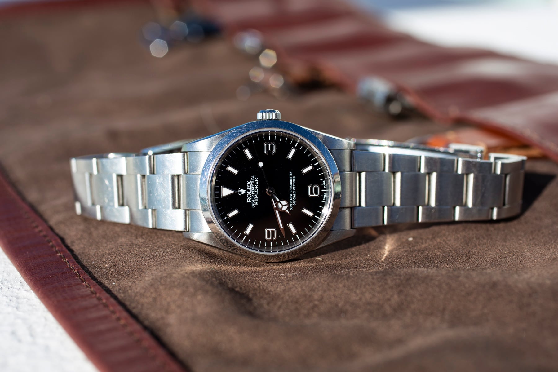Rolex Explorer ref. 114270 on its side, crown up