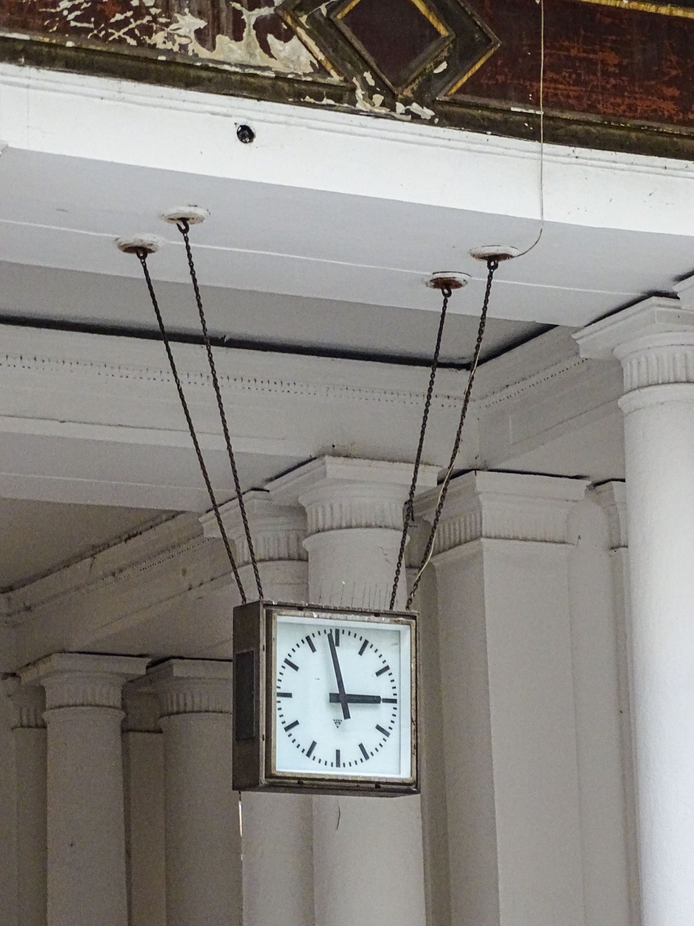 square Pragotron clock hanging