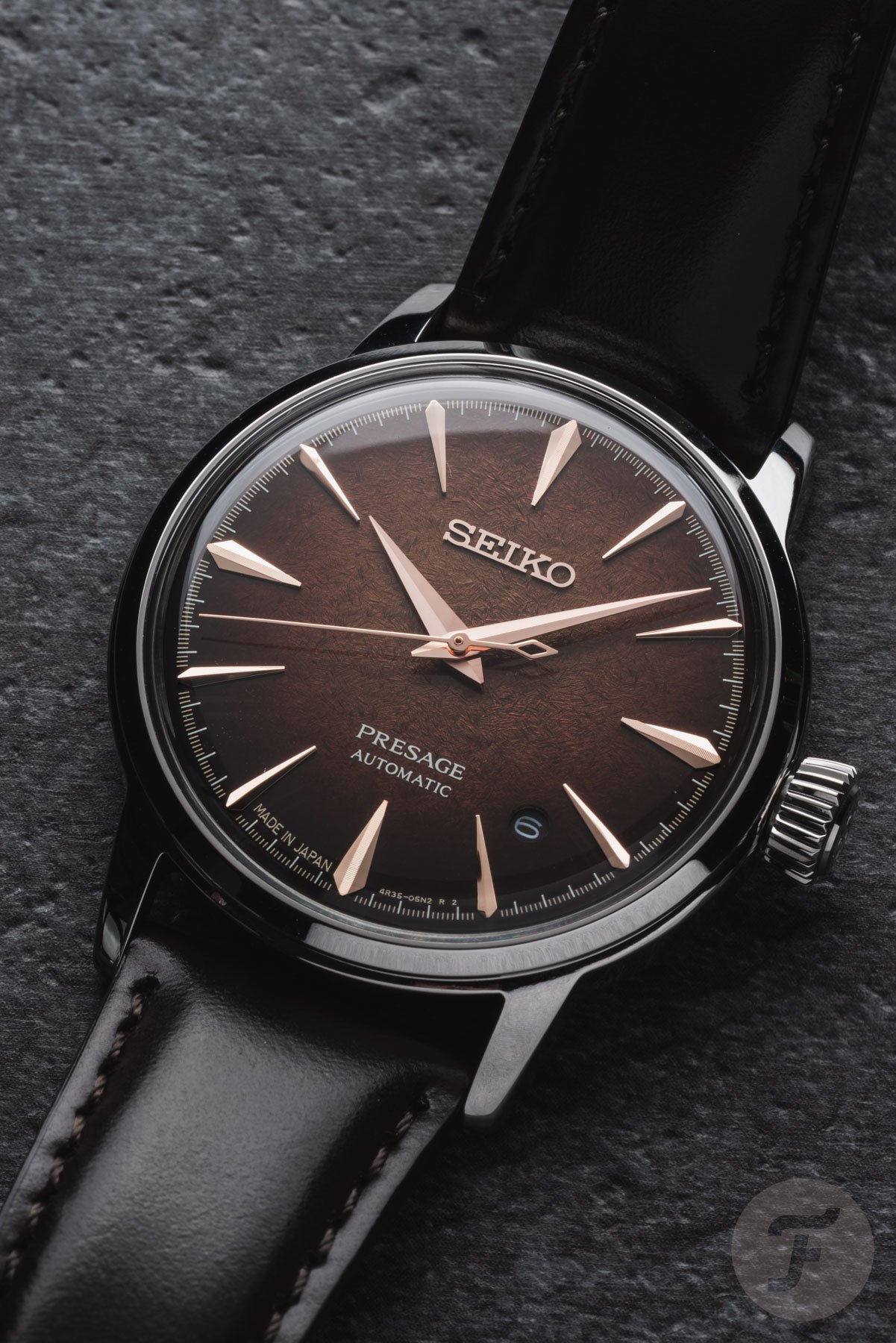 Seiko Presage Cocktail Time HCB003 on a stone surface
