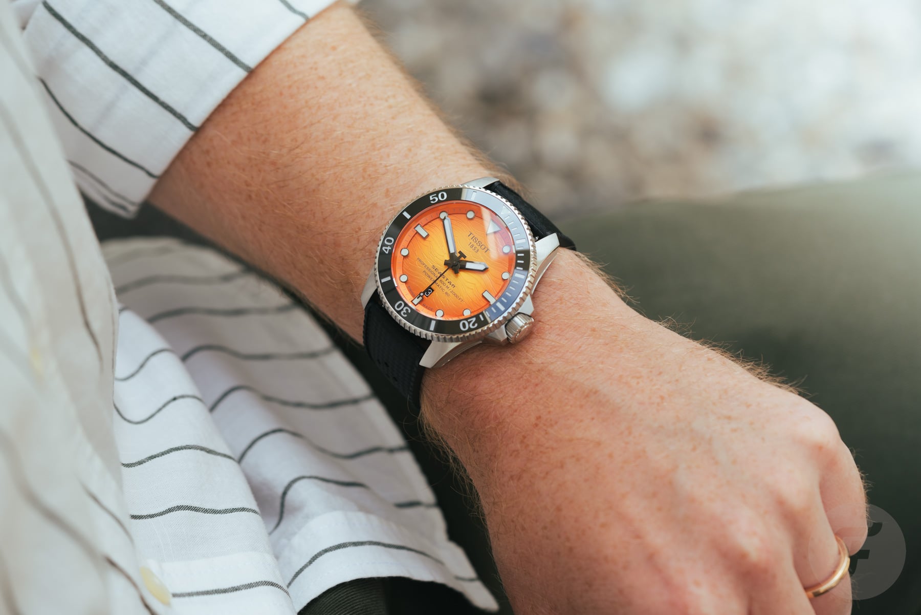 orange-dial Tissot Seastar 2000 Professional on the wrist