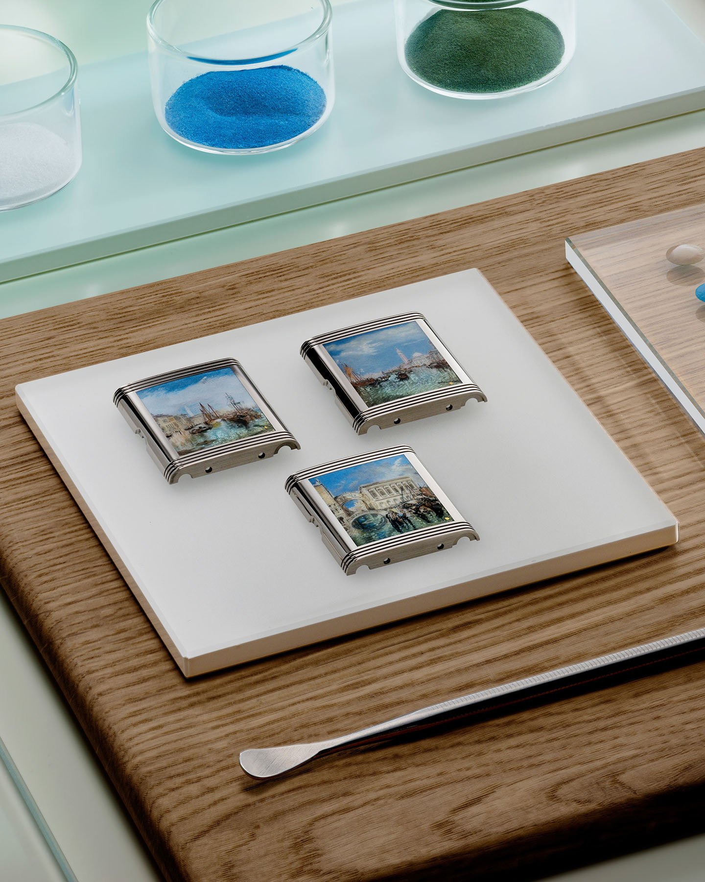case backs of three Jaeger-LeCoultre Reverso Tribute Enamel Turner Series variants