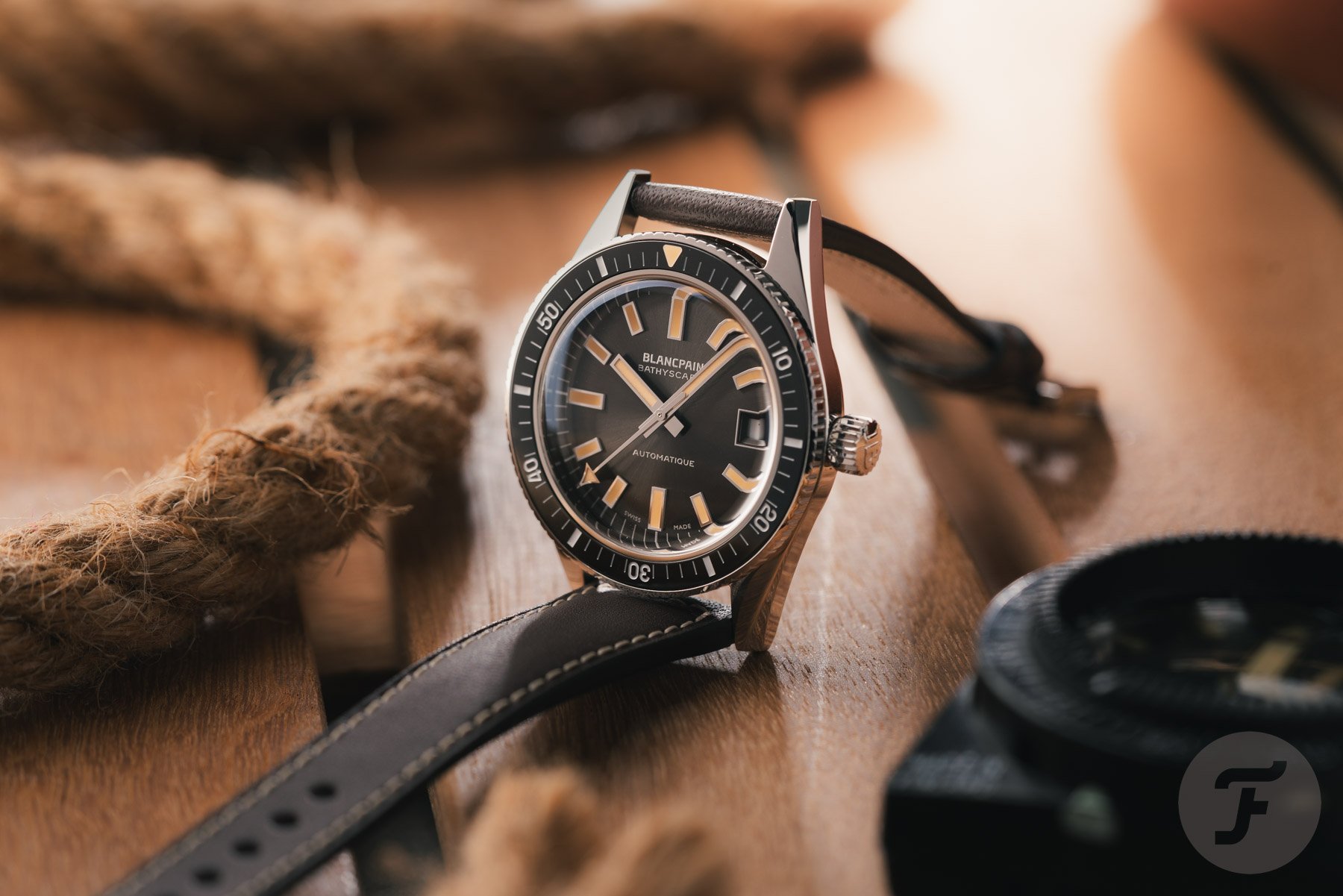 Blancpain Fifty Fathoms Bathyscaphe 70th Anniversary propped up with strap