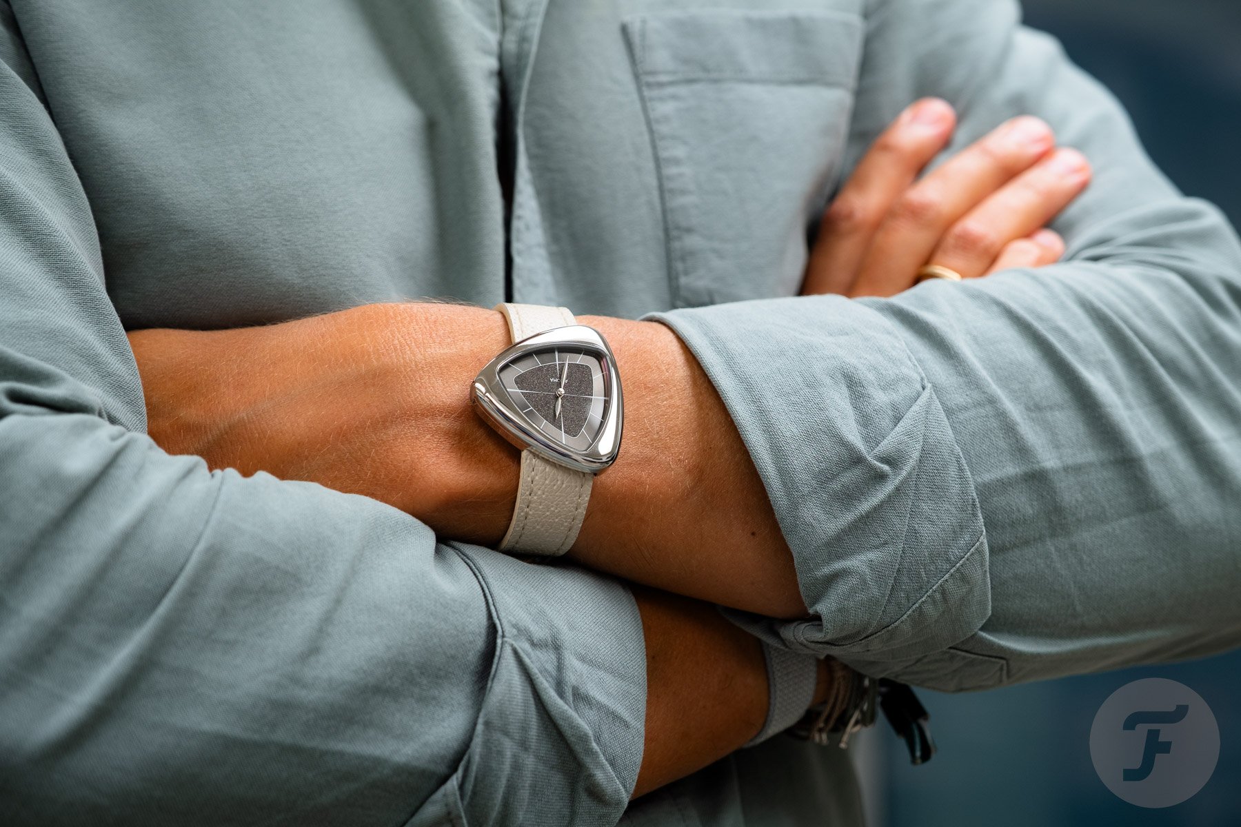 microbrands — Anoma A1 Core Collection "Stone" on wrist, arms crossed