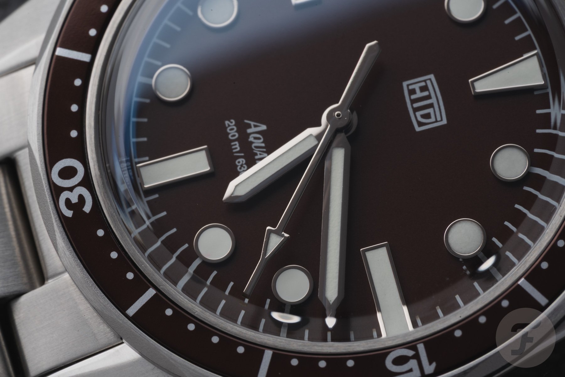 brown HTD Aquatìc Bicchierini dial and bezel detail