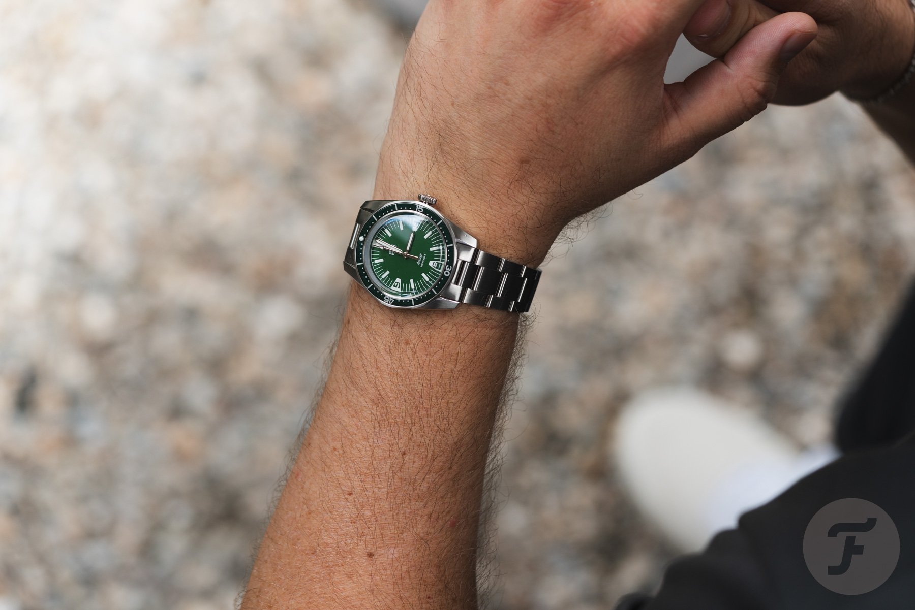 green-dial HTD Aquatìc SpaceBoy on wrist
