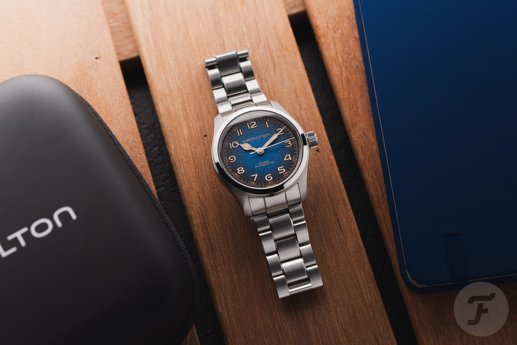 blue-dial Hamilton Khaki Field Murph 38mm flat-lay