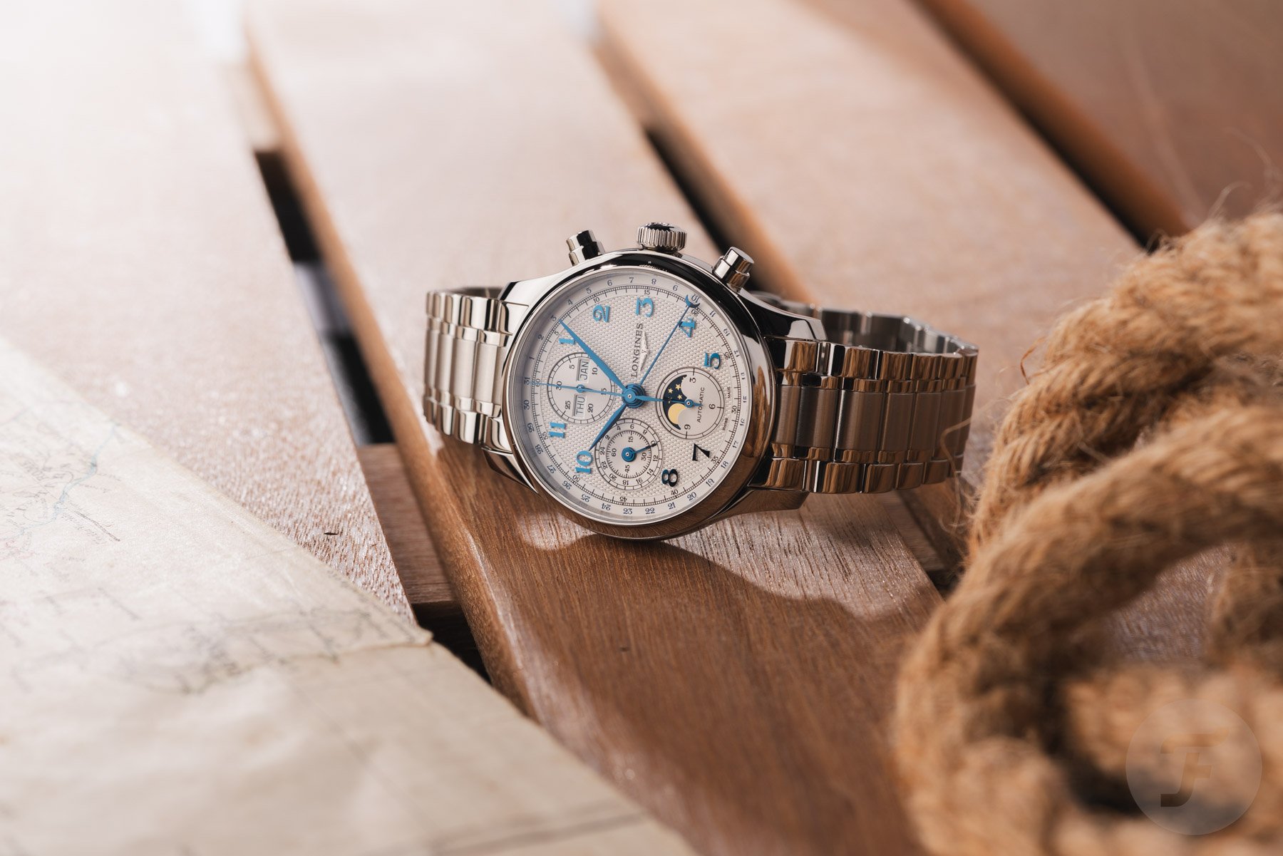 Longines Master Chrono Moonphase on its side, crown up