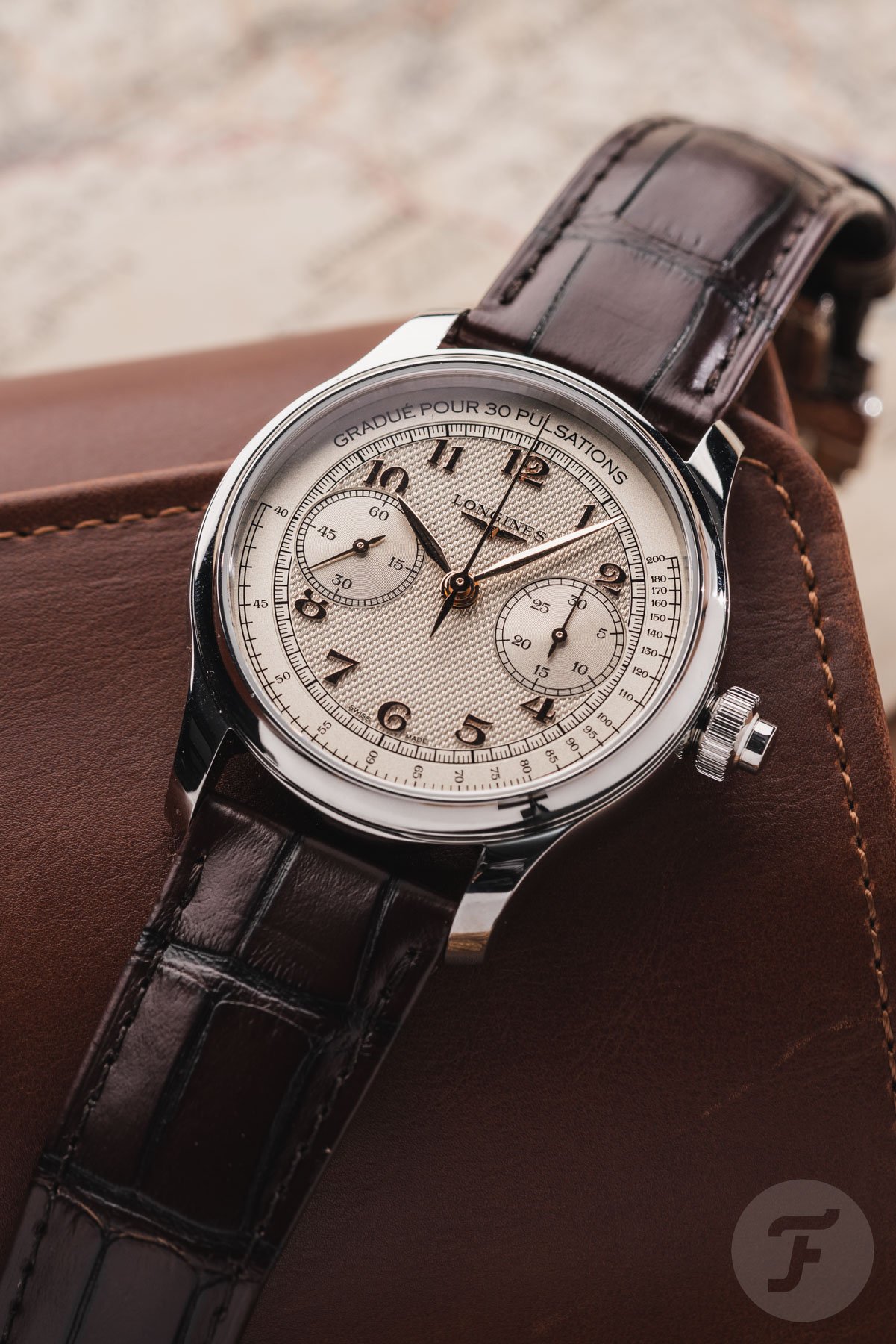 Longines Master Chrono Monopusher on leather watch roll