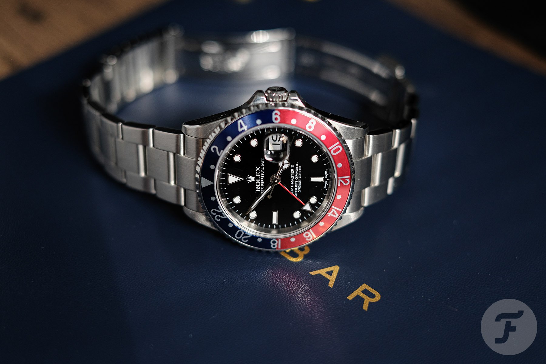 Rolex GMT-Master II 16710 on its side, crown up