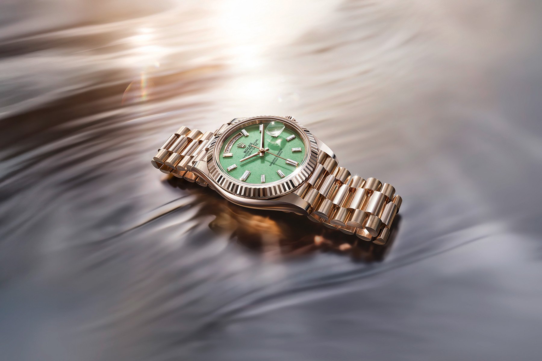 Off-catalog Rolex Day-Date 40 ref. 228235JG-0003 with a green dial