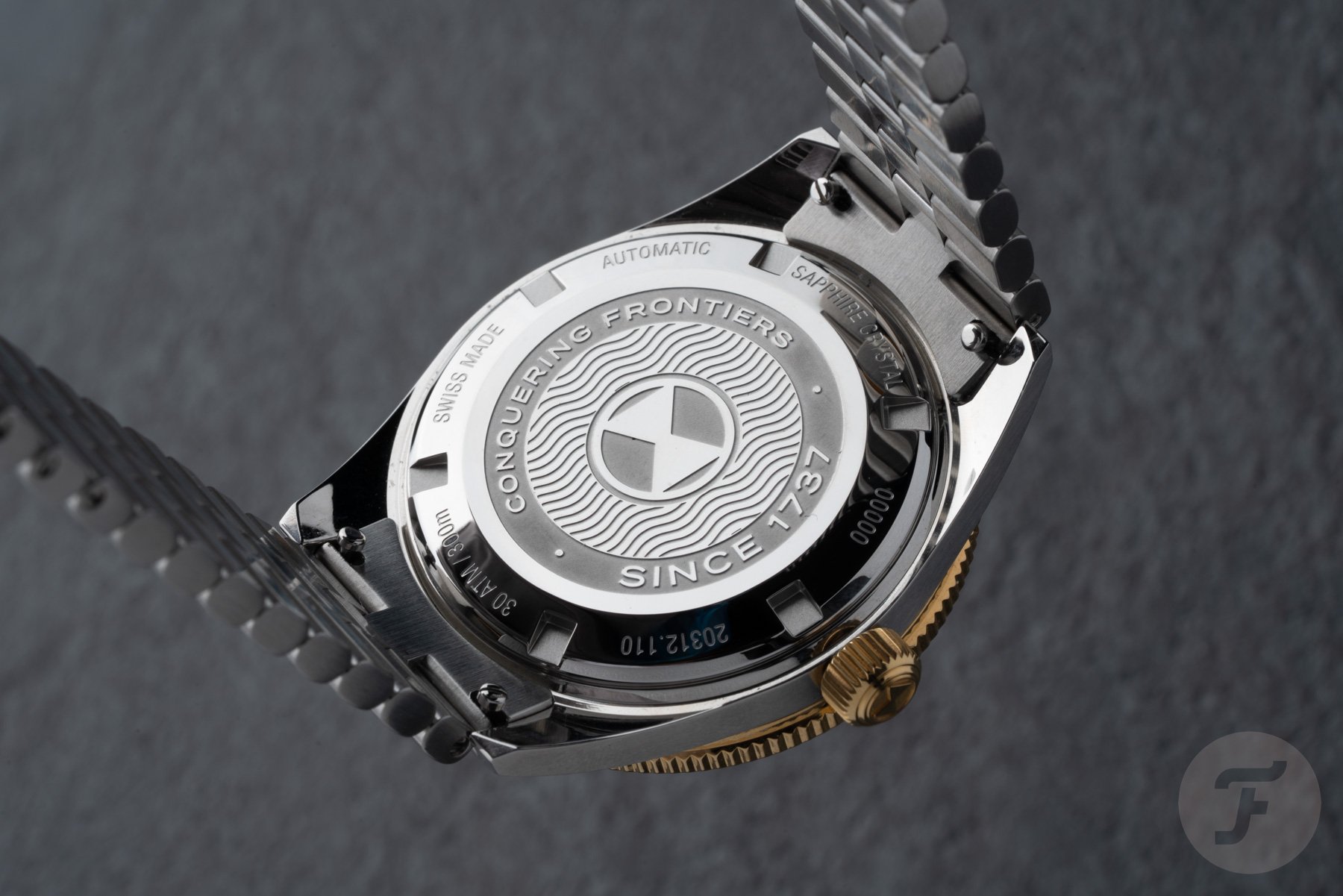 two-tone Favre Leuba Deep Raider Day Date case back