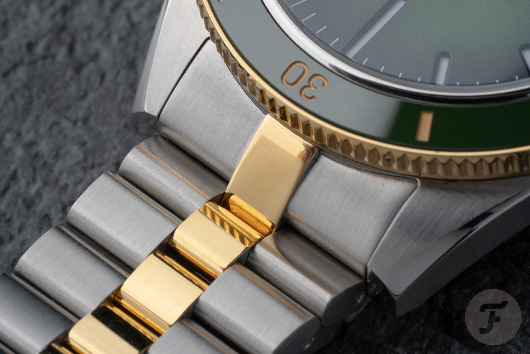 two-tone Favre Leuba Deep Raider Day Date bracelet up close