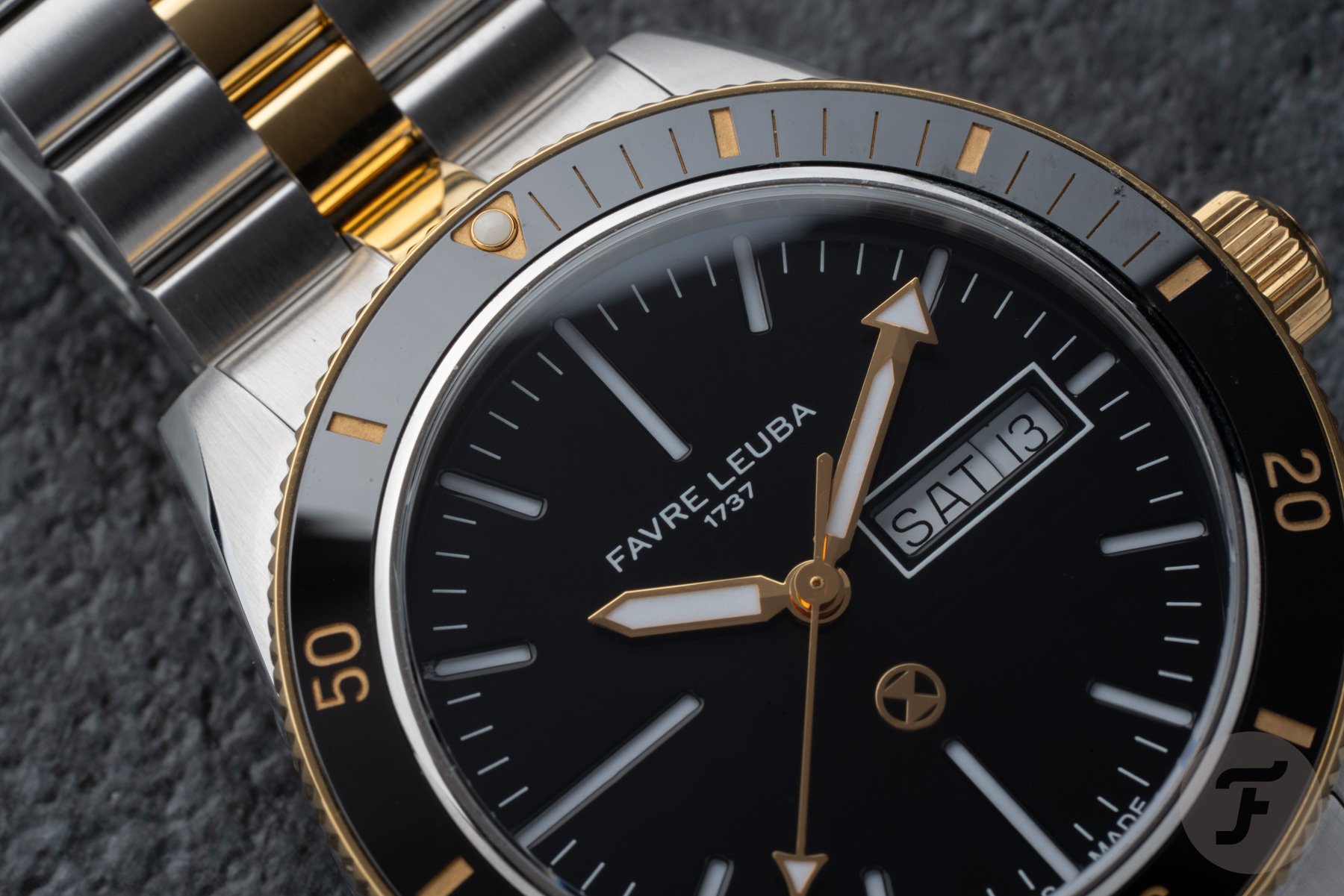 two-tone Favre Leuba Deep Raider Day Date black dial and bezel close up