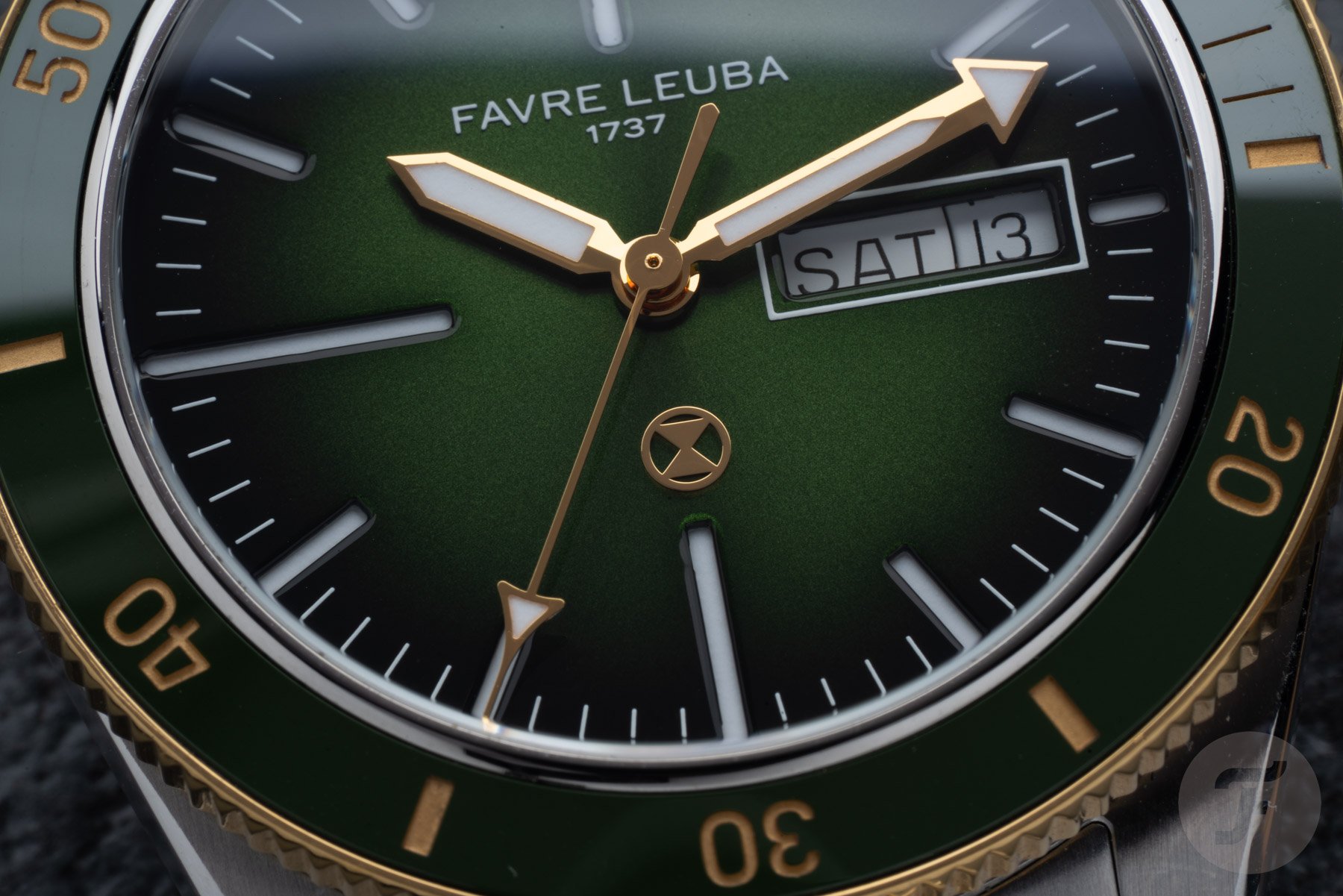 two-tone Favre Leuba Deep Raider Day Date green dial up close