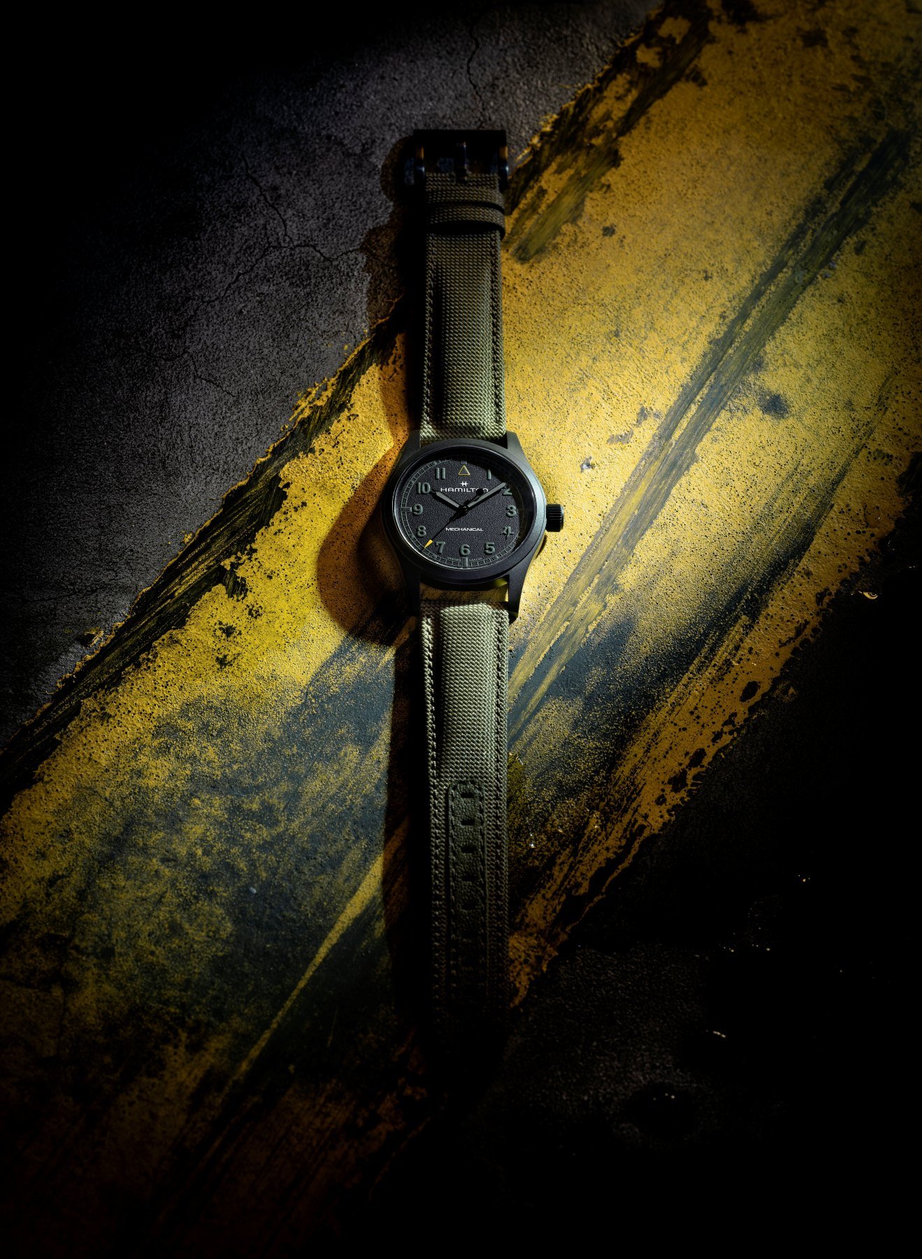 flat-lay of the Lume shot of the Hamilton Khaki Field Mechanical 38mm for Call of Duty: Modern Warfare 4
