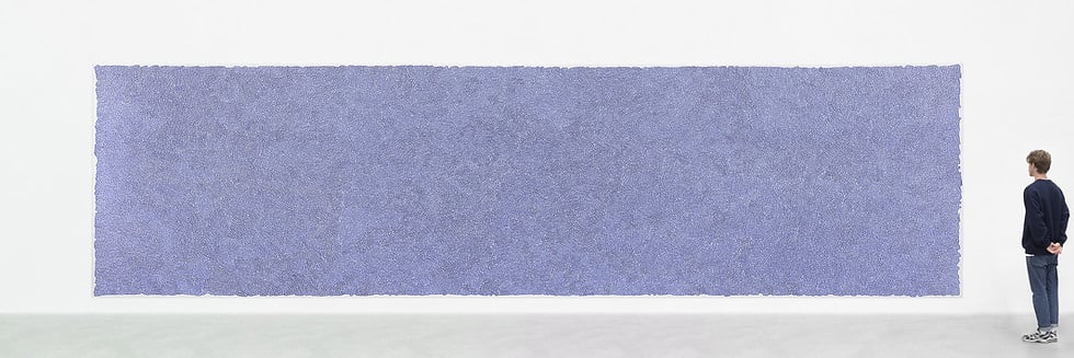 Jules Wittock next to one of his 10m-long paintings