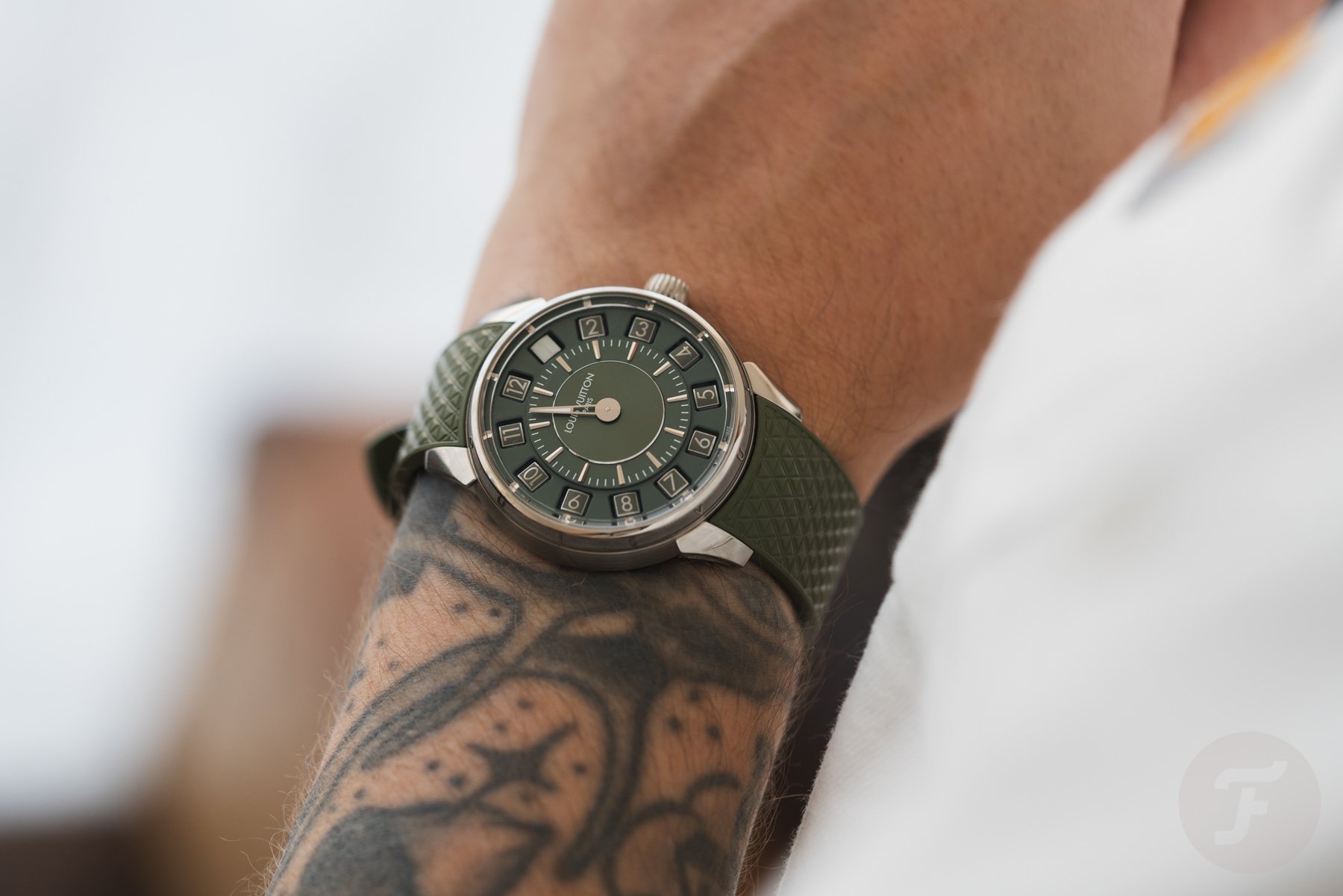 Louis Vuitton Tambour Spin Time Green on wrist