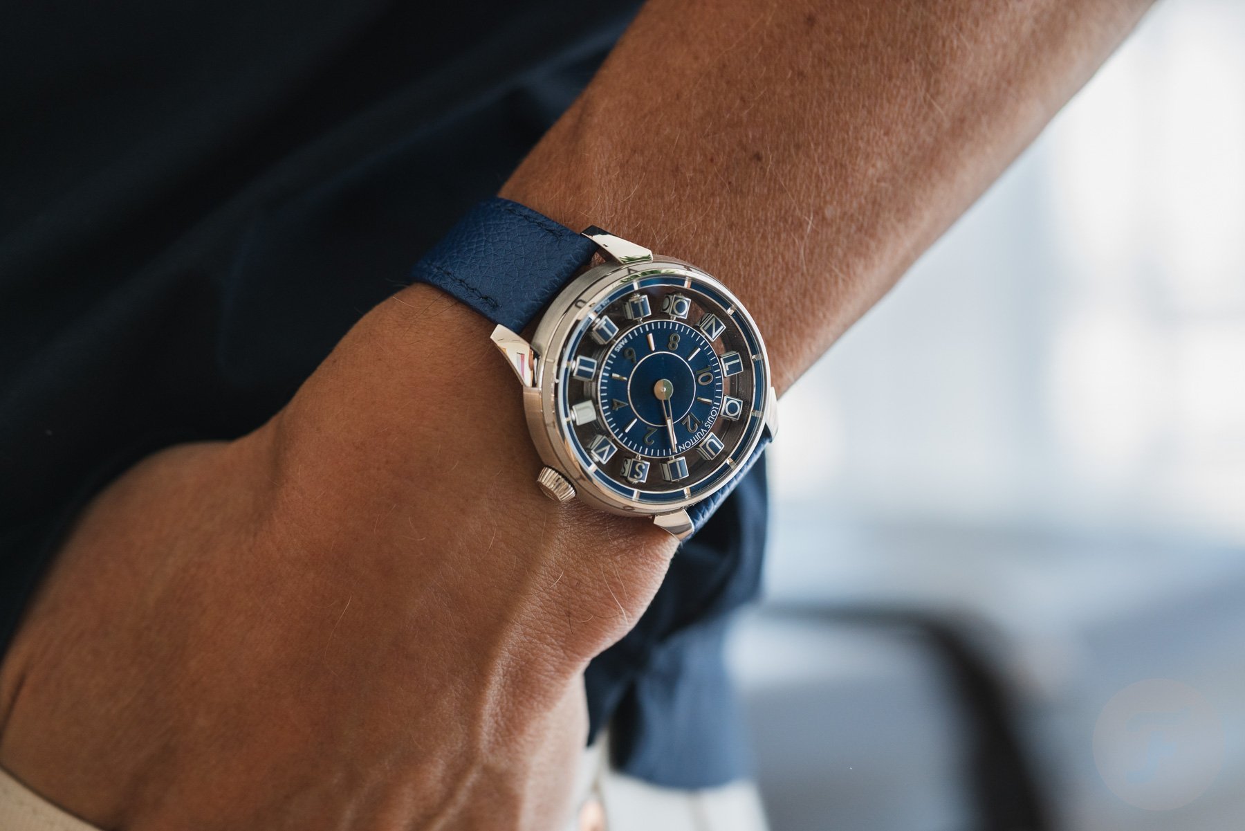 Louis Vuitton Tambour Spin Time Air Blue pocket shot