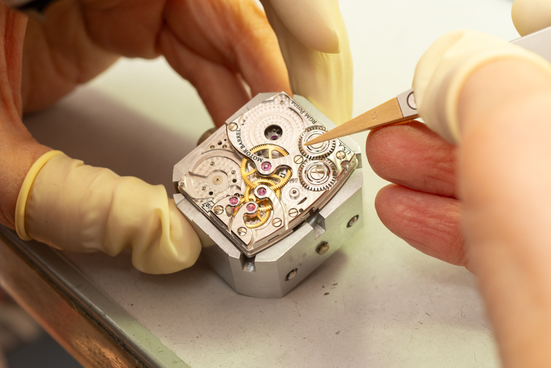 watchmaker working on an RGM movement