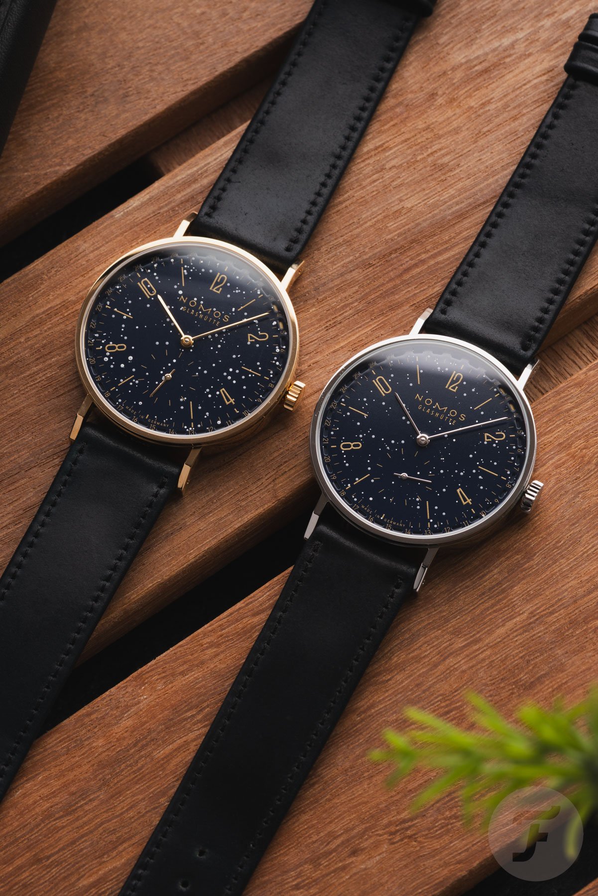 Nomos Twice Unique Tangente Neomatik 38 Urania watches side by side, flat-lay