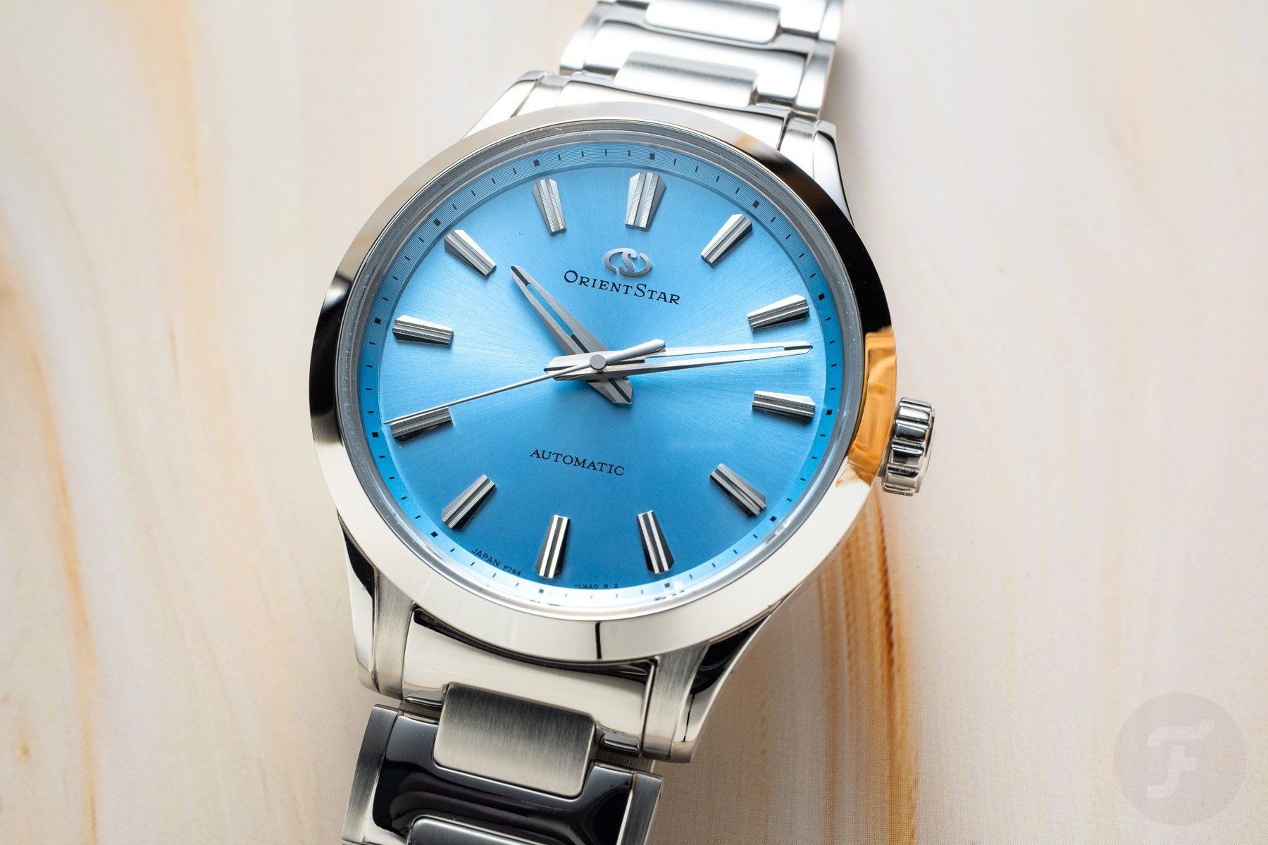 blue-dial Orient Star Sakigake Three Hand up close