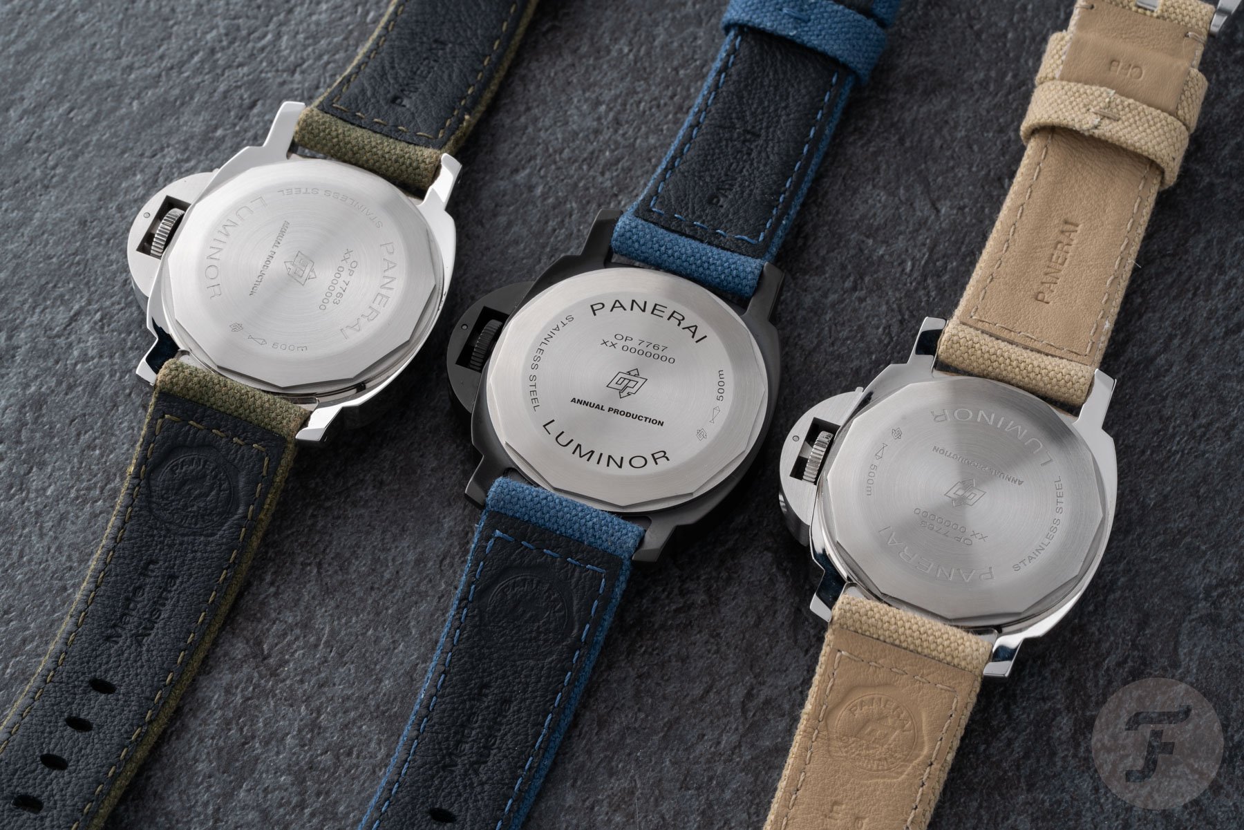 Panerai Luminor PAM01710, PAM01711, and PAM01714 lined up, face down
